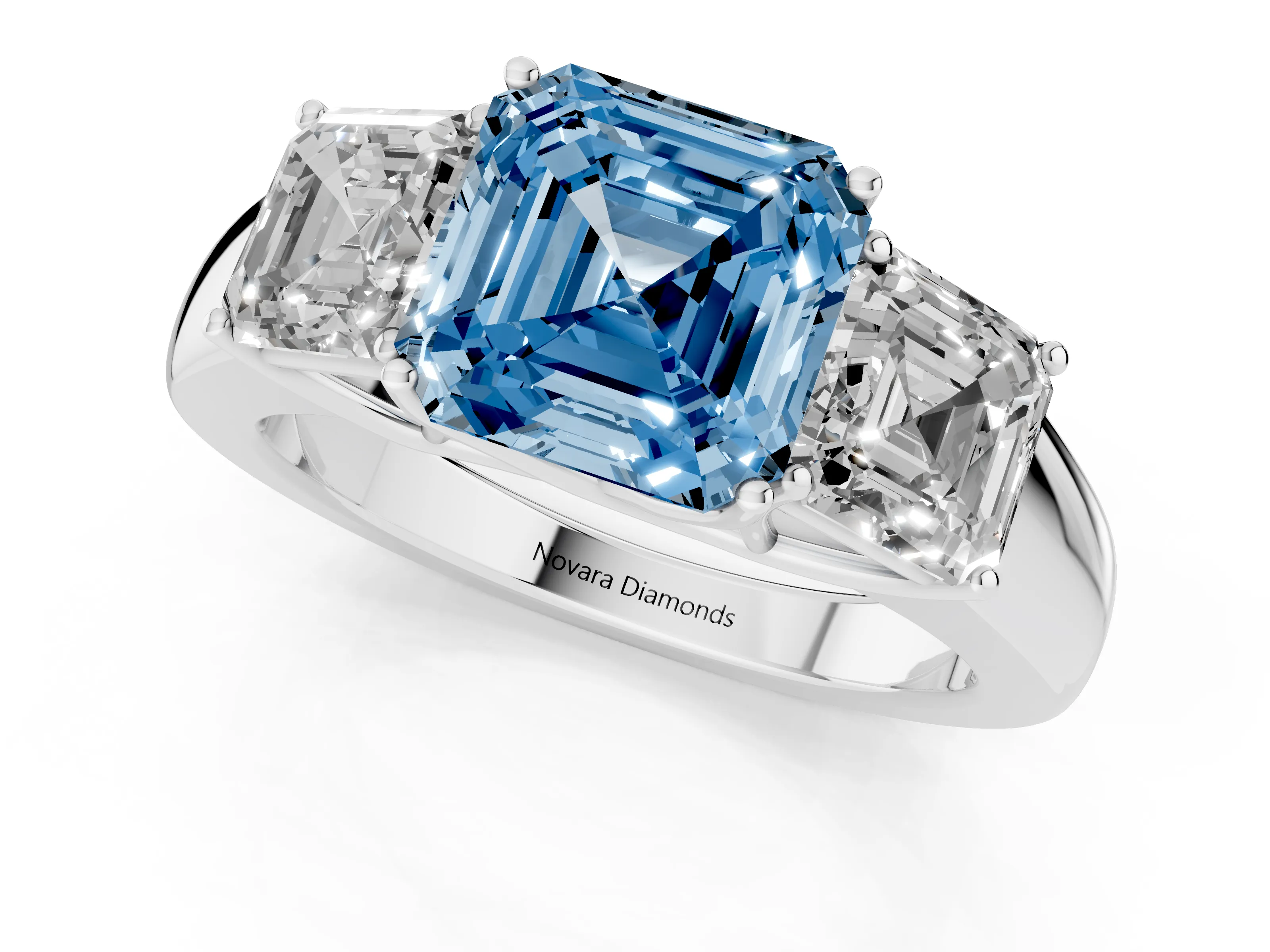 Fancy Blue Three-Stone Asscher Cut Diamond Ring Set in Silver with Matching Prong Settings and Plain Band