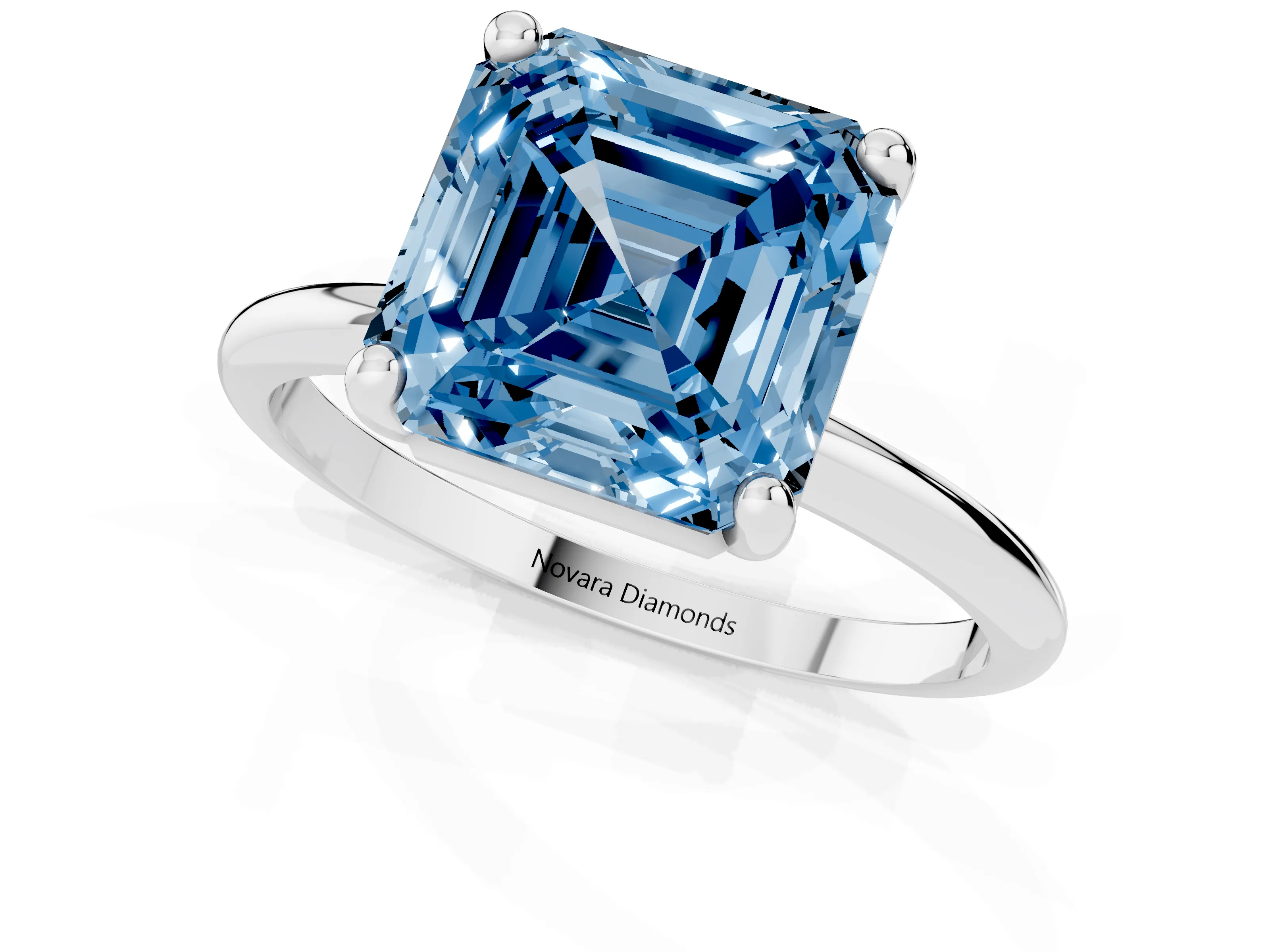 Fancy Blue Asscher Cut Diamond Solitaire Ring Set in Silver with Secure Prong Setting on a Classic Band