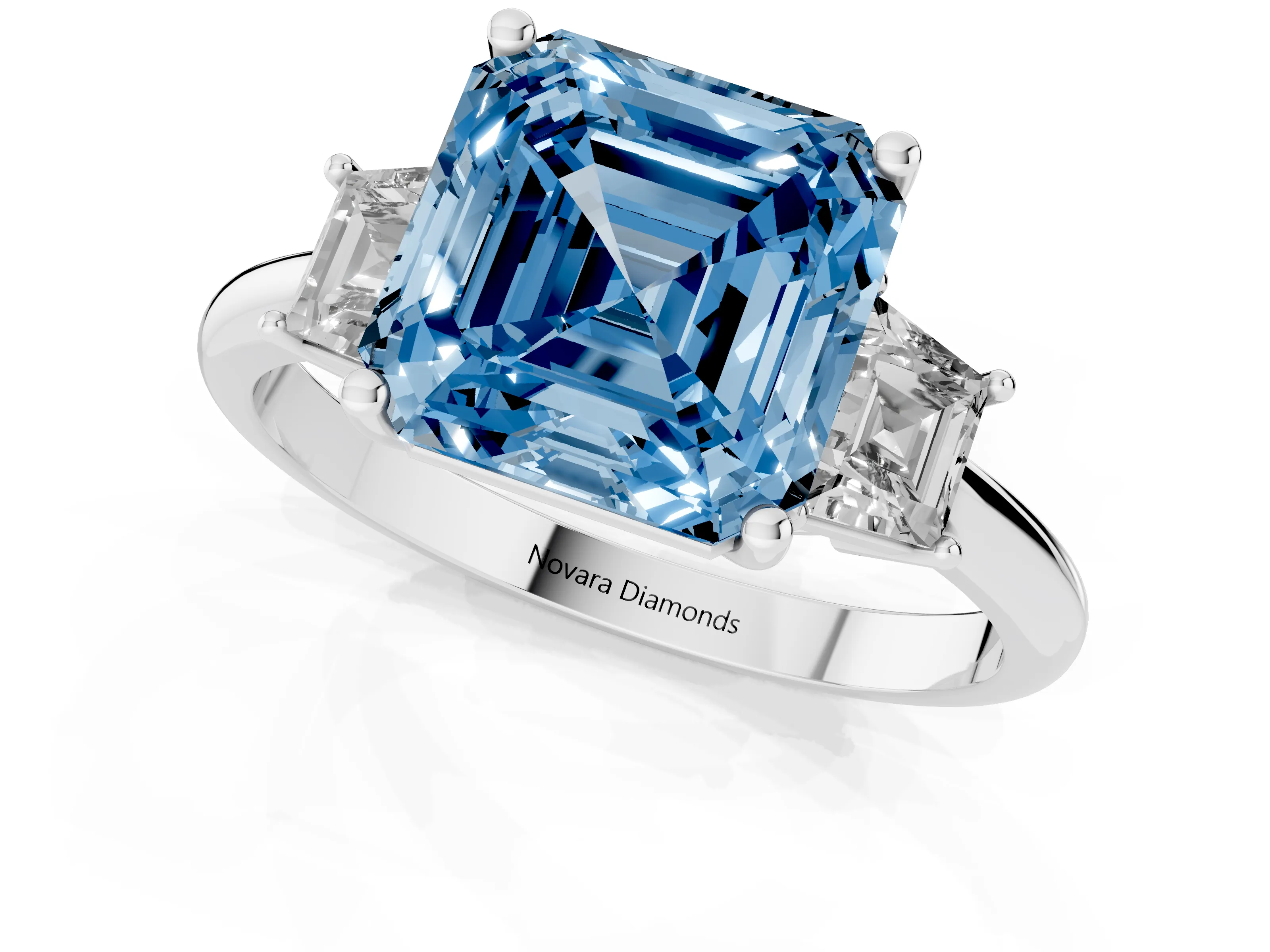 Fancy Blue Asscher Cut Diamond Three-Stone Ring Set in Platinum with Trapezoid Side Stones and Prong Setting