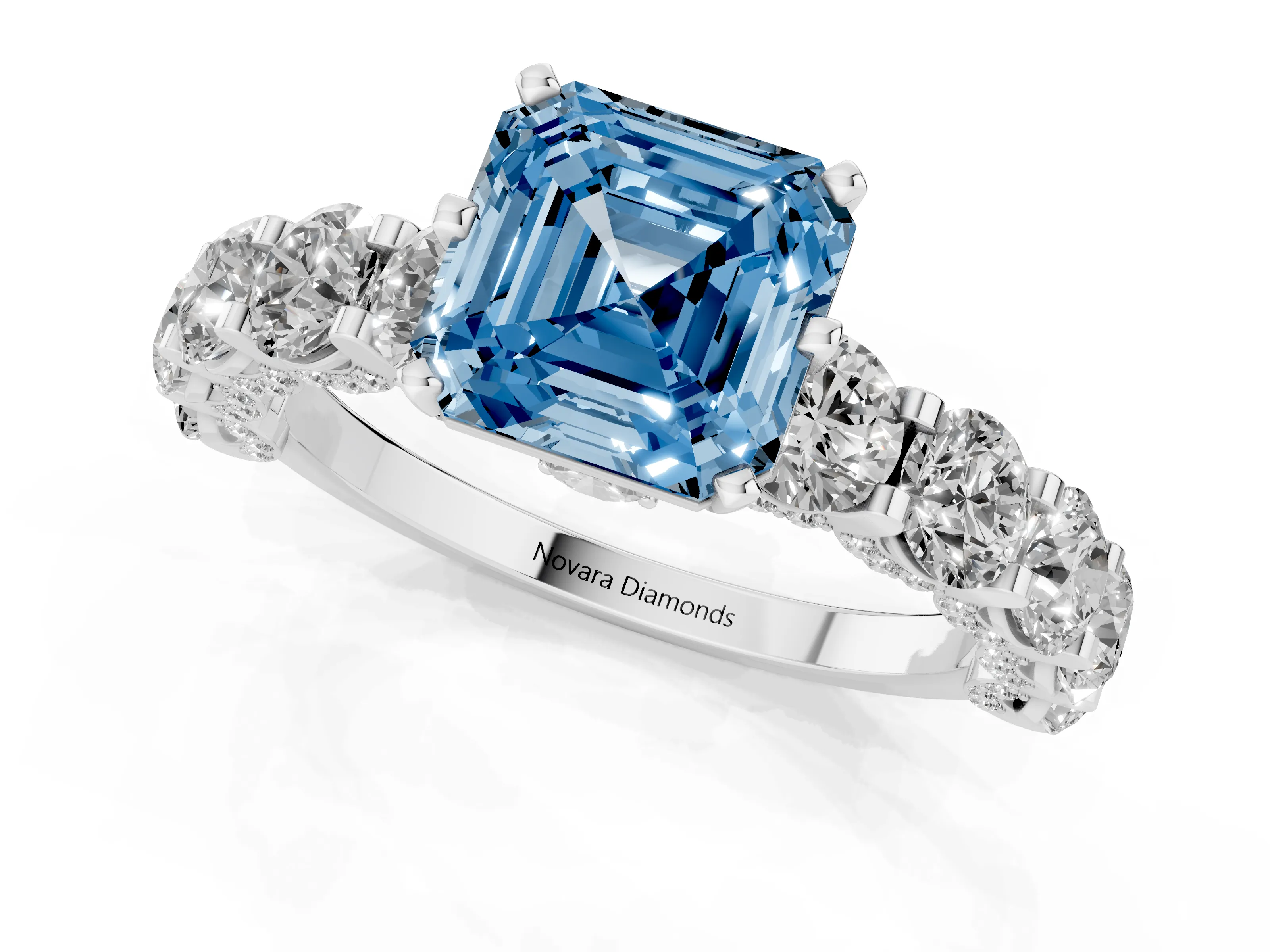 Fancy Blue Asscher Cut Diamond Side Stone Ring Set in Silver with Alternating Round and Oval Side Stones