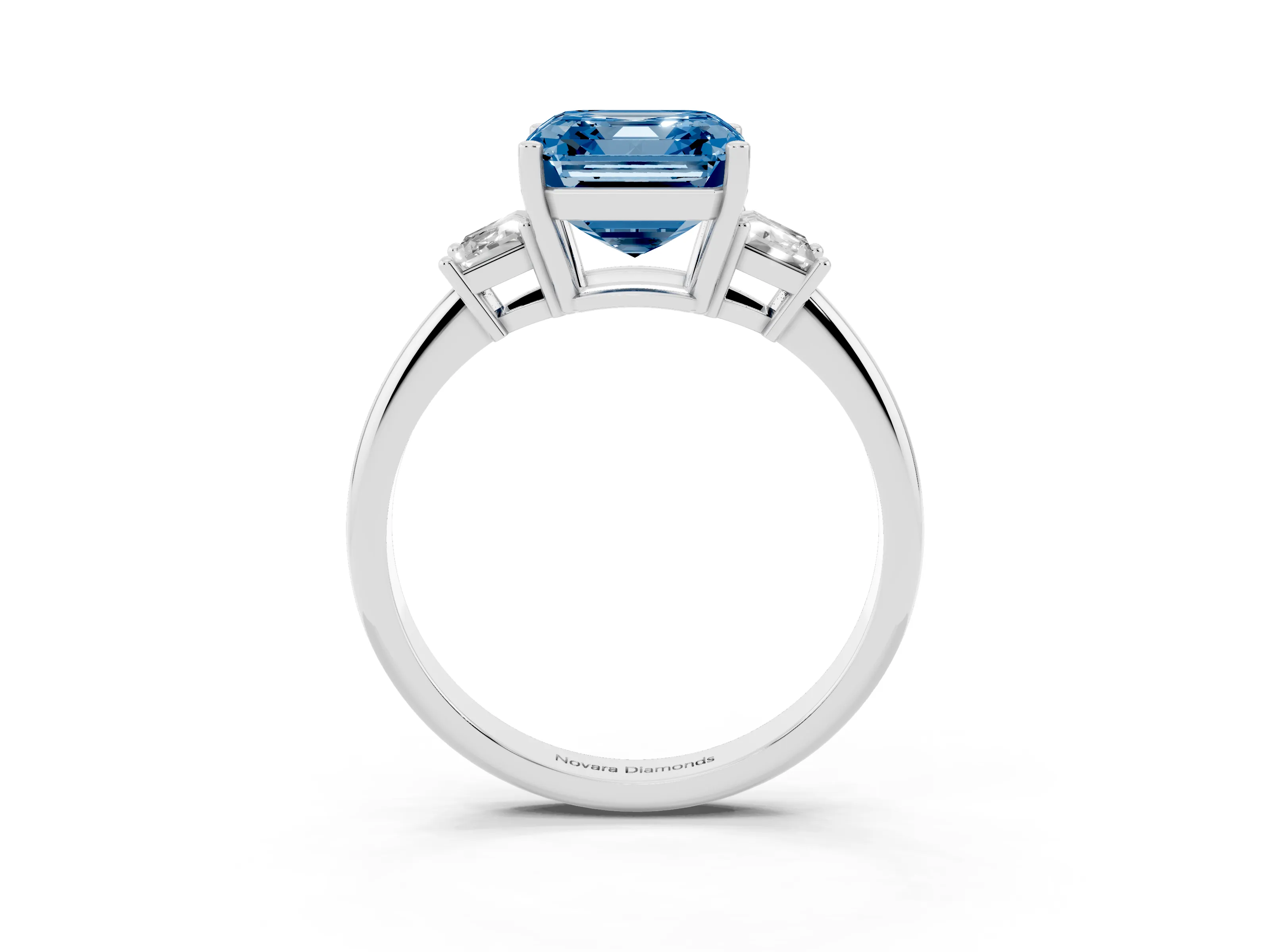 Fancy Blue Asscher Cut Diamond Three-Stone Ring Set in Platinum with Trapezoid Side Stones and Prong Setting