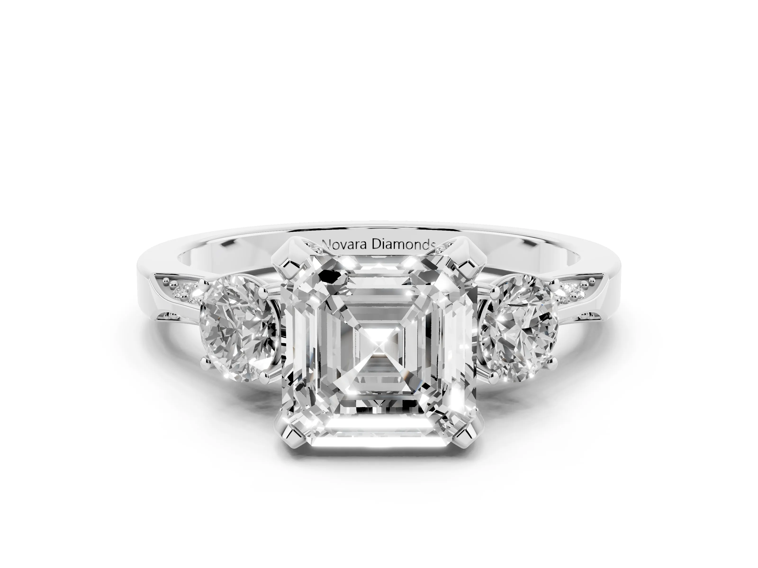 Asscher Cut Diamond Three-Stone Ring Set in White gold with Pavé Band and Smaller Side Stones