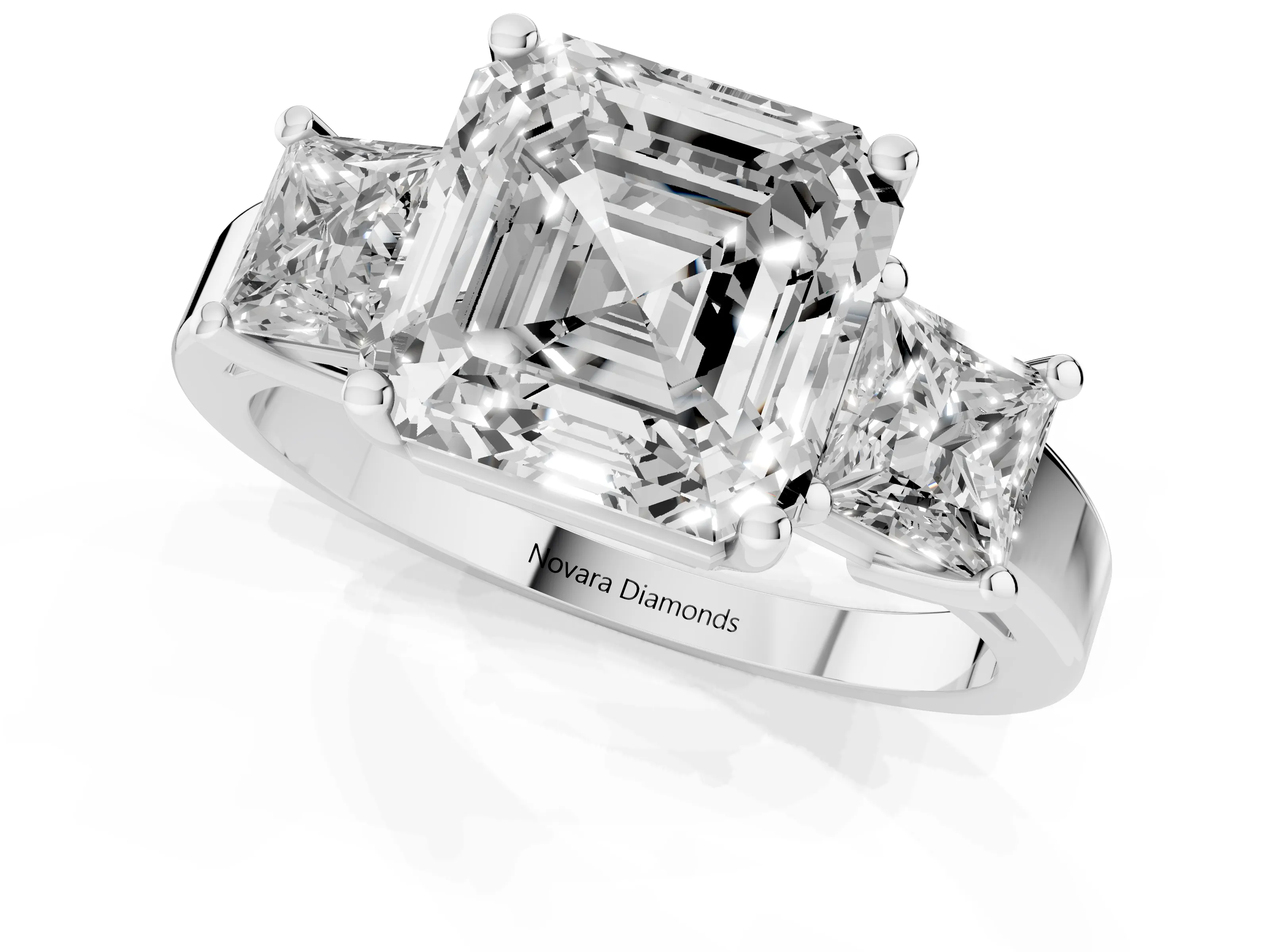 Three-Stone Asscher Cut Diamond Solitaire Ring Set in Platinum with Prong Setting