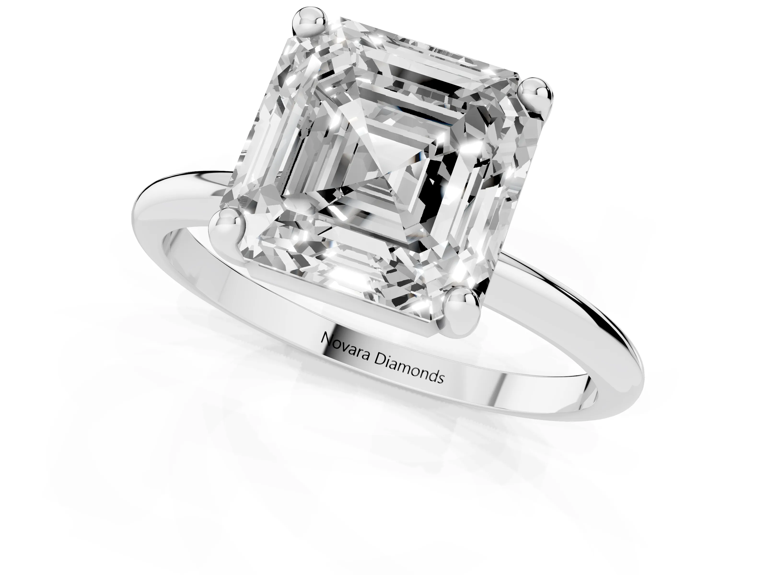 Asscher Cut Diamond Solitaire Ring Set in Silver with Secure Prong Setting on a Classic Band