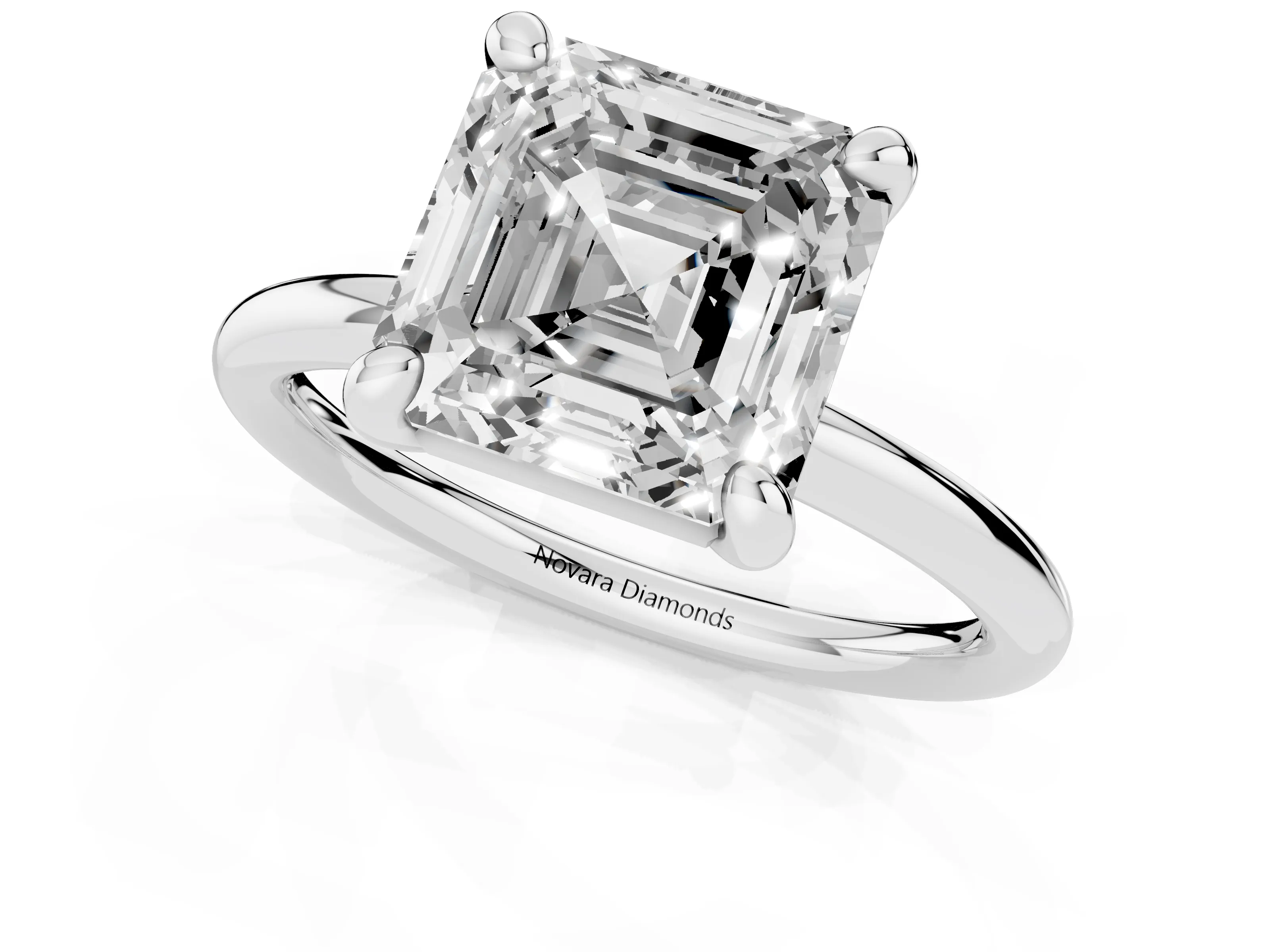 Asscher Cut Diamond Solitaire Ring Set in White gold with Prong Setting on a Polished Plain Band