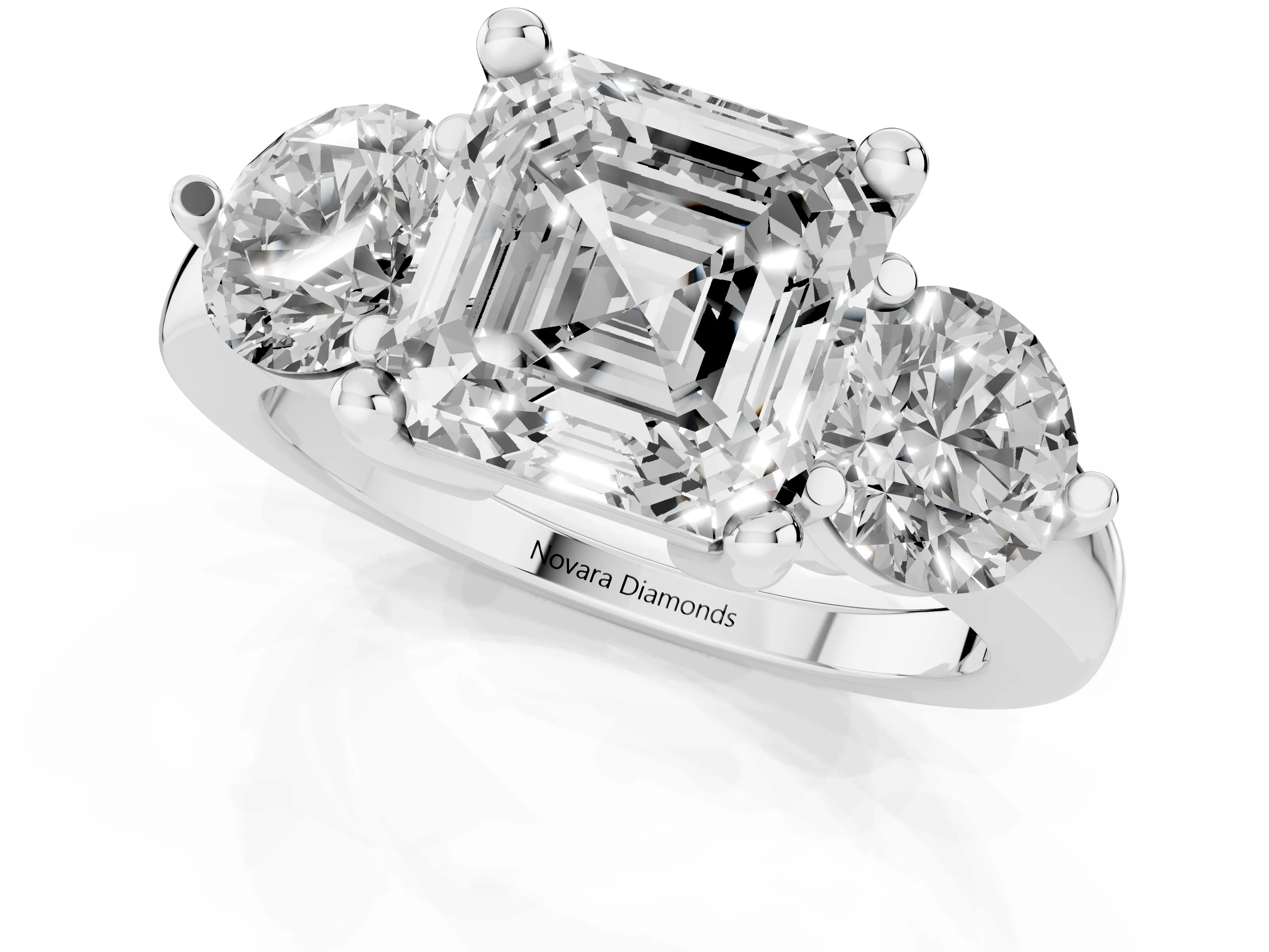 Asscher Cut Diamond Three-Stone Ring Set in Silver with Prong Setting and Classic Band