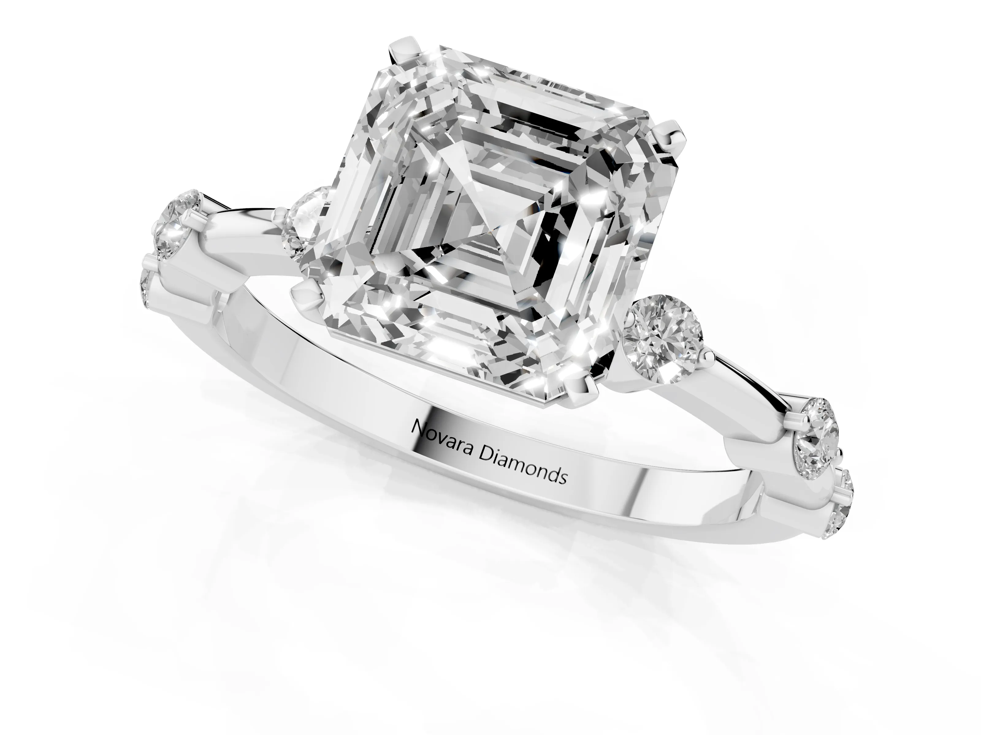 Asscher Cut Diamond Solitaire Ring Set in Platinum with Bezel Set Side Stones and Prong Setting