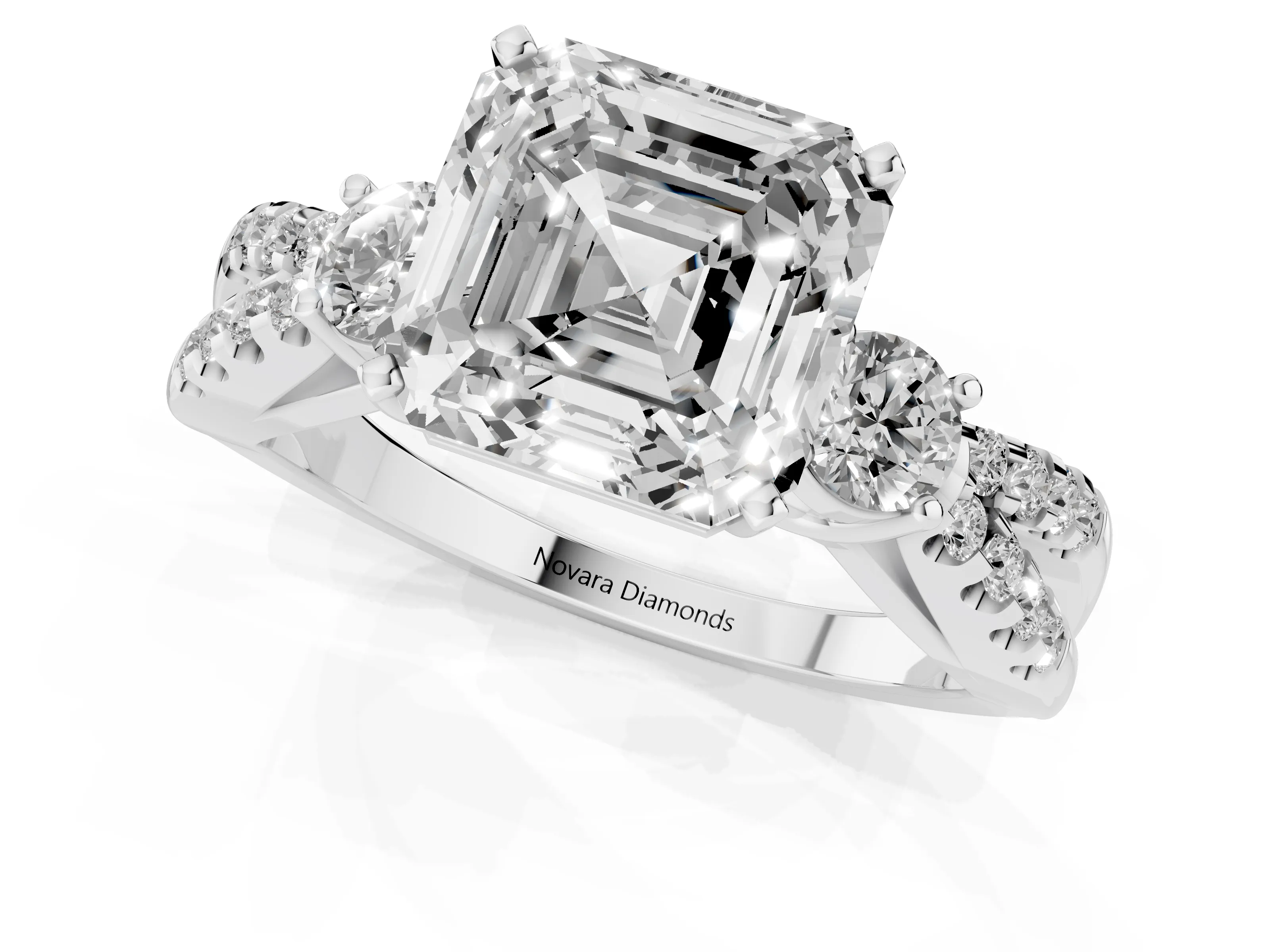 Asscher Cut Diamond Three-Stone Ring Set in Platinum with Pavé Split Shank and Prong Setting