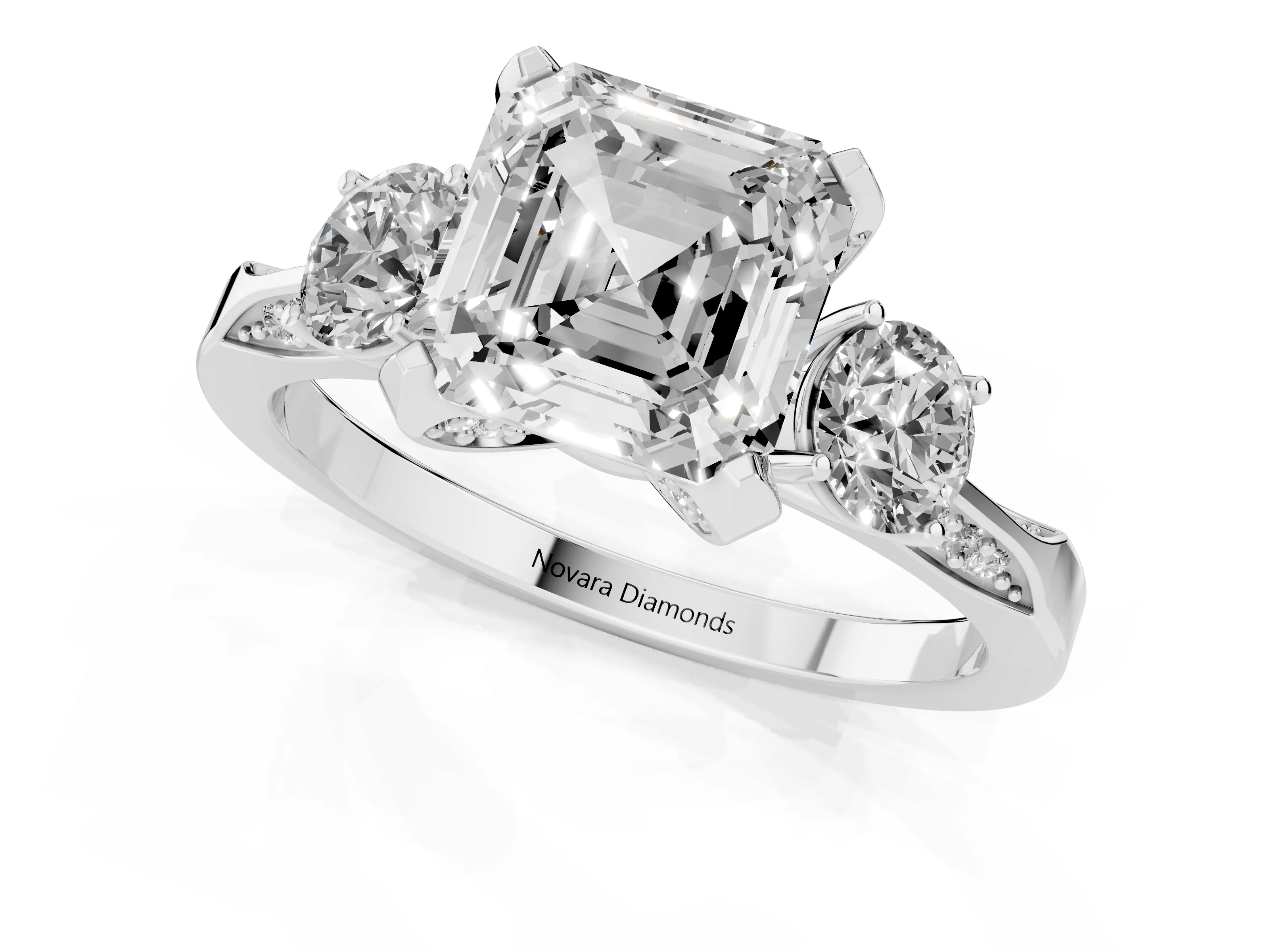 Asscher Cut Diamond Three-Stone Ring Set in Platinum with Pavé Band and Smaller Side Stones