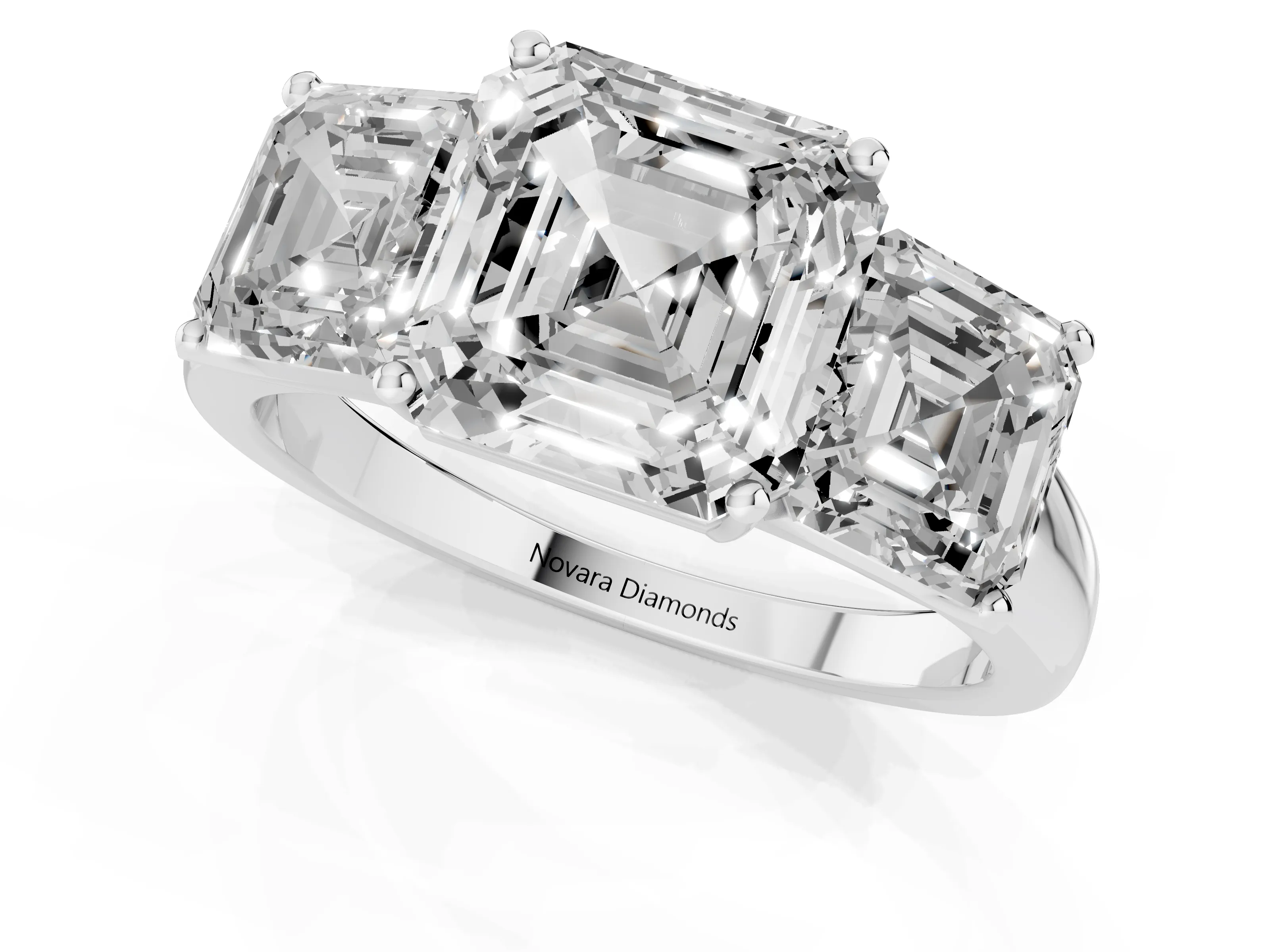 Asscher Cut Diamond Three-Stone Ring Set in Silver with Classic Prong Setting and Plain Band