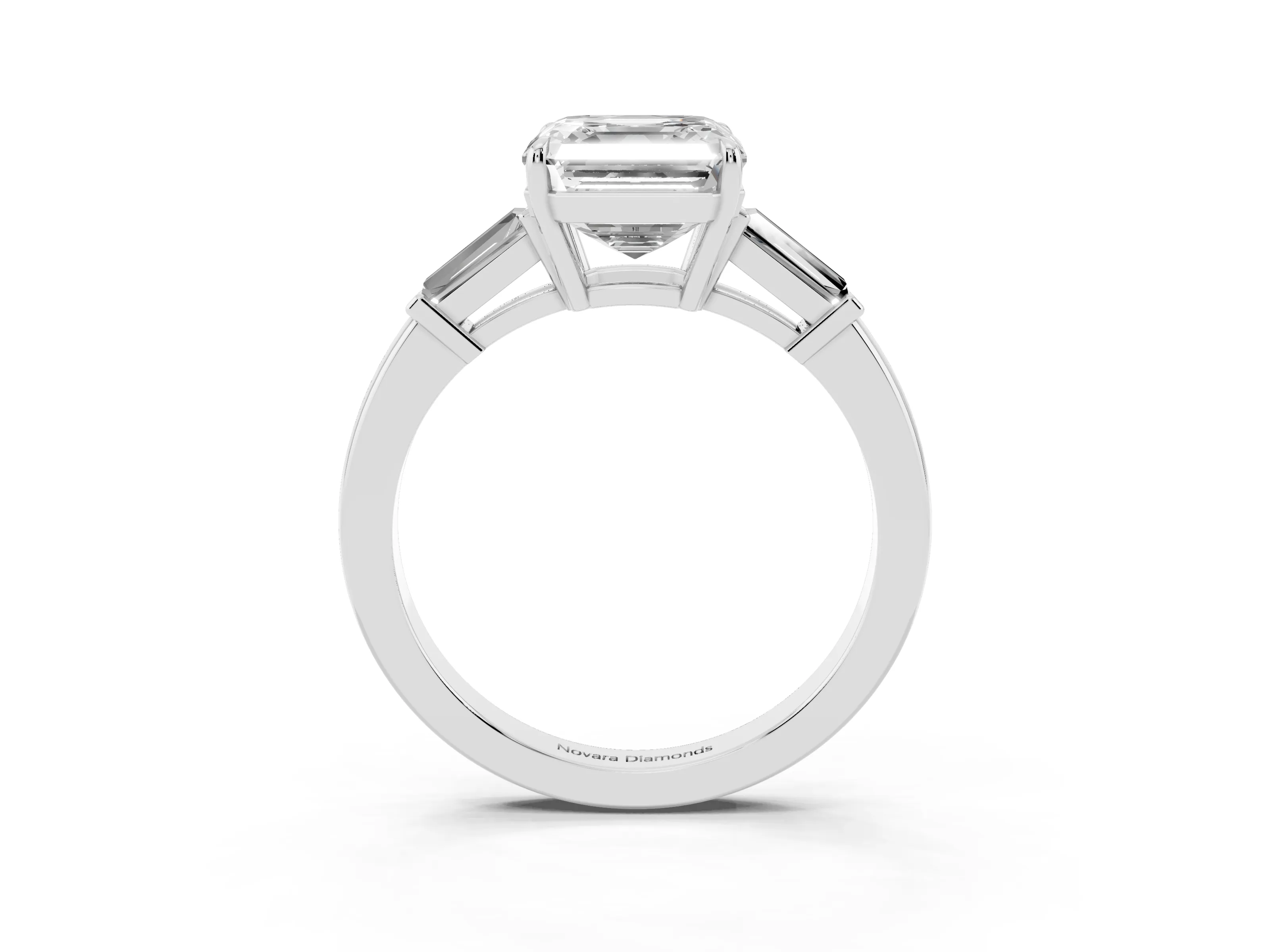 Asscher Cut Diamond Three-Stone Ring Set in White gold with Tapered Baguette Side Stones and Prong Setting