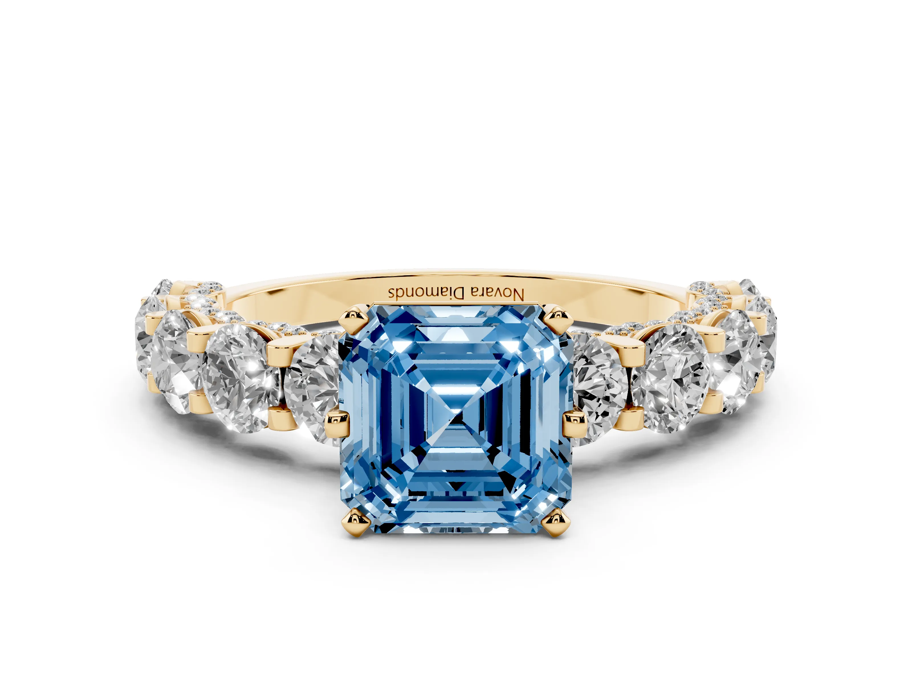 Fancy Blue Asscher Cut Diamond Side Stone Ring Set in Yellow gold with Alternating Round and Oval Side Stones