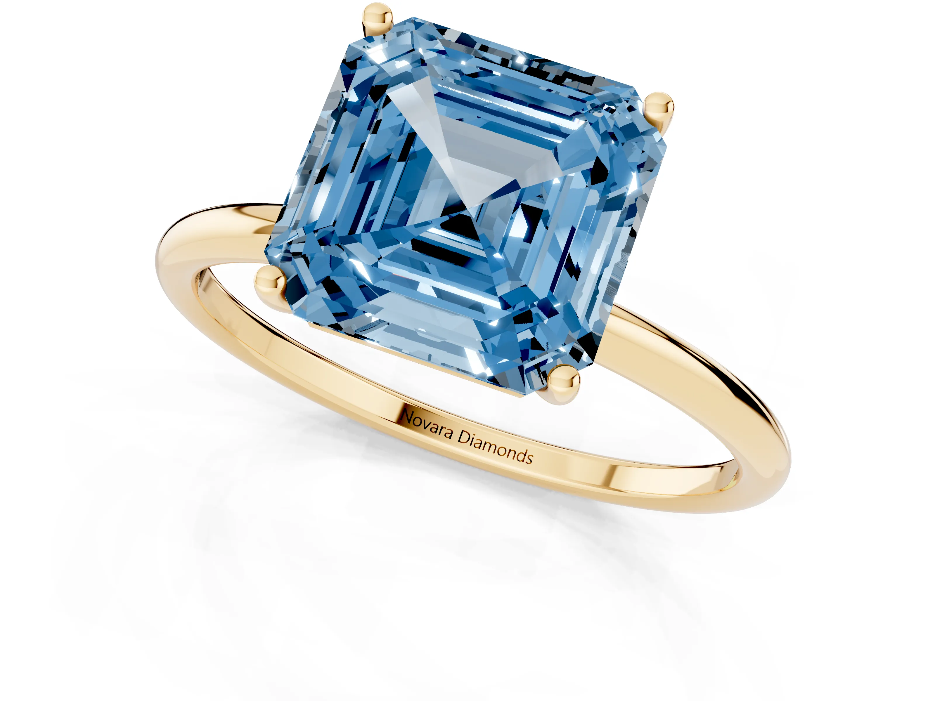 Fancy Blue Asscher Cut Diamond Solitaire Engagement Ring Set in Yellow gold with Thin Band and Prong Setting