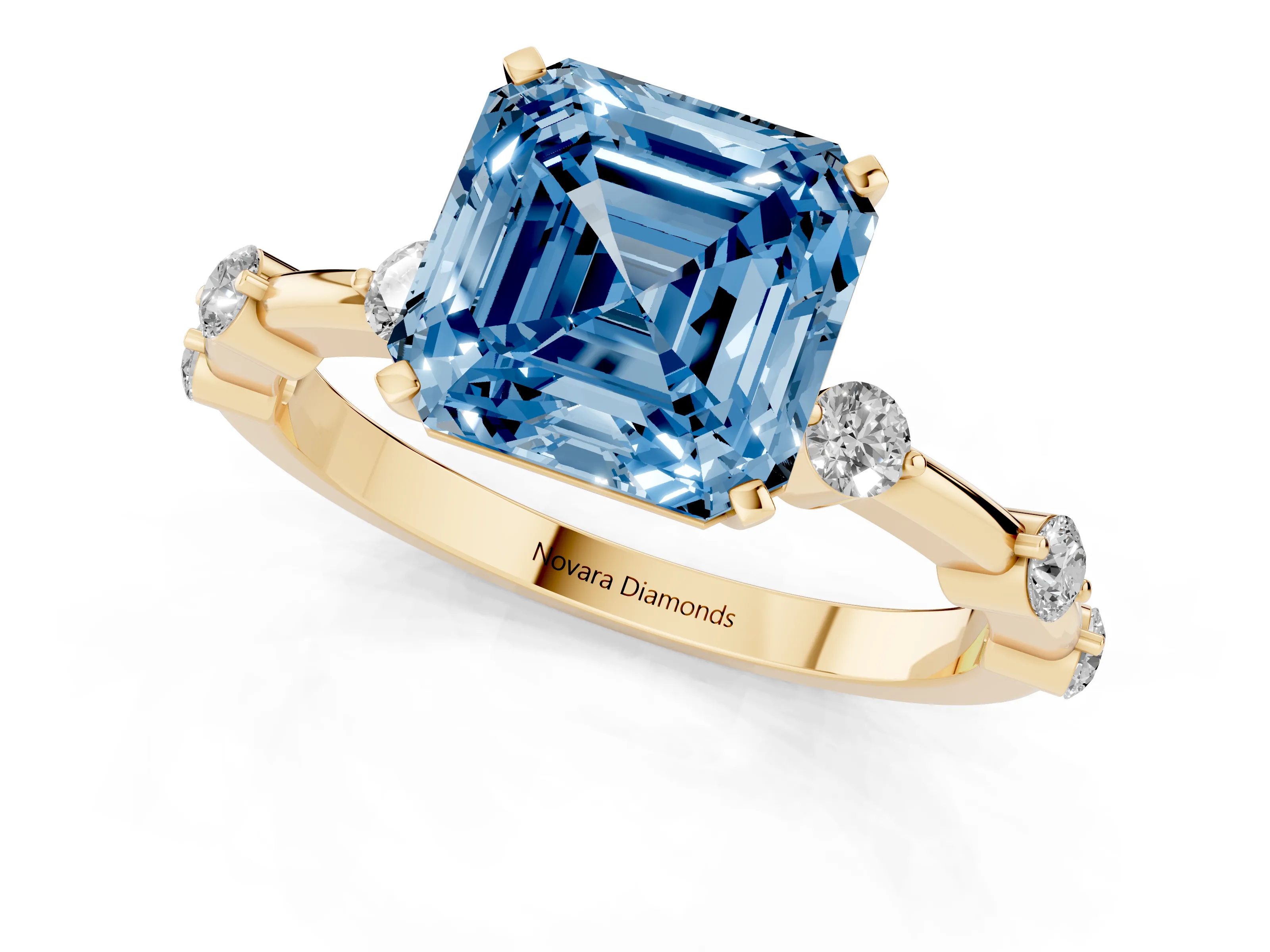 Fancy Blue Asscher Cut Diamond Solitaire Ring Set in Yellow gold with Bezel Set Side Stones and Prong Setting