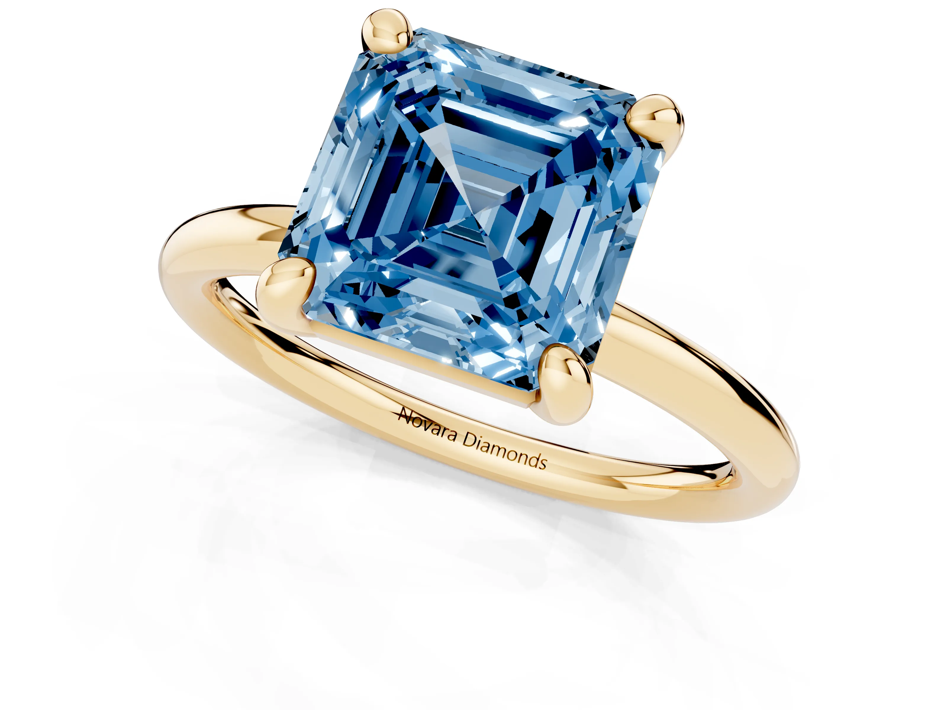 Fancy Blue Asscher Cut Diamond Solitaire Ring Set in Yellow gold with Prong Setting on a Polished Plain Band