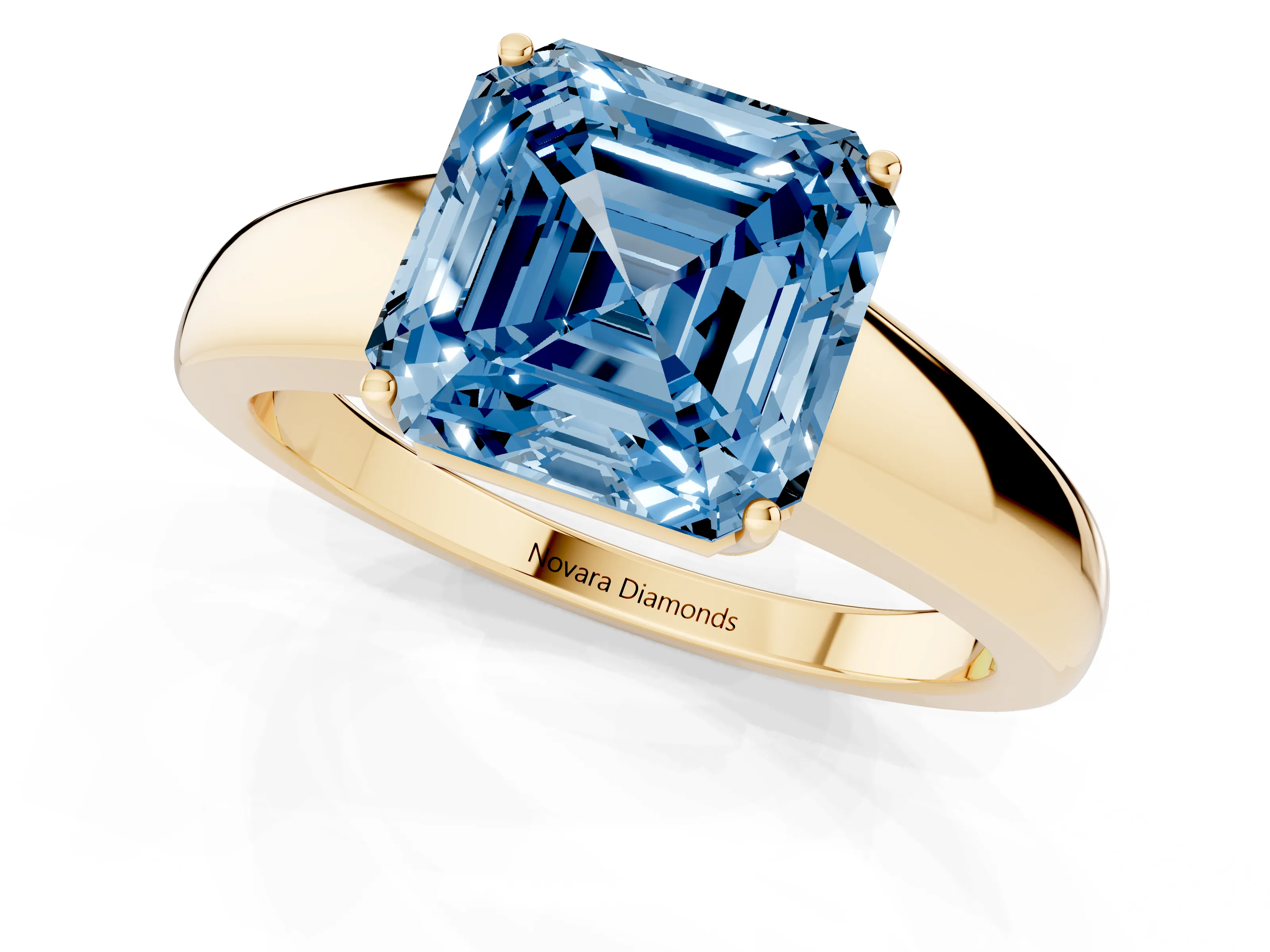 Fancy Blue Asscher Cut Diamond Solitaire Ring Set in Yellow gold with Tapered Band and Prong Setting