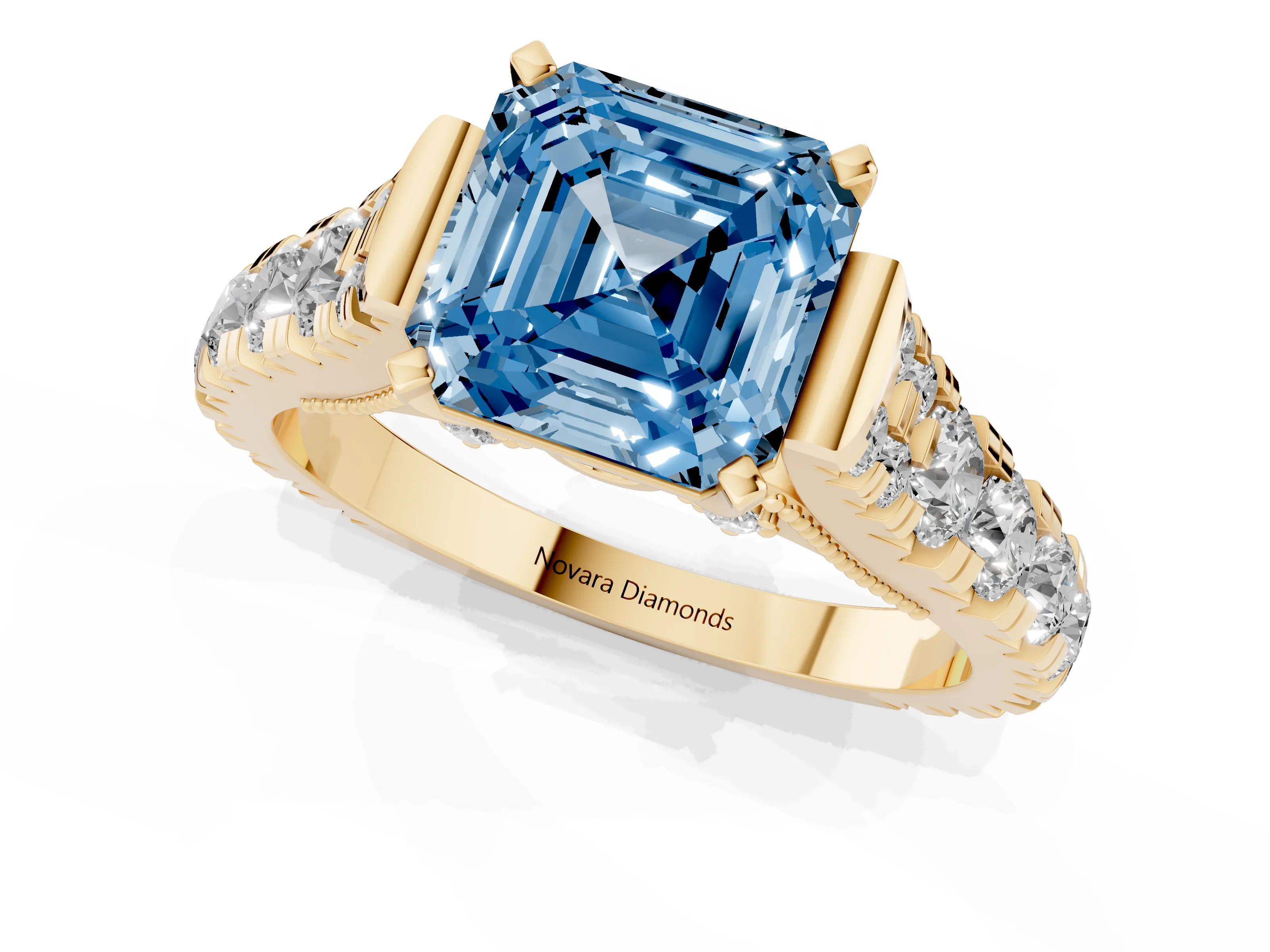 Fancy Blue Asscher Cut Diamond Classic Solitaire Ring Set in Yellow gold with Pavé Band and Prong Setting