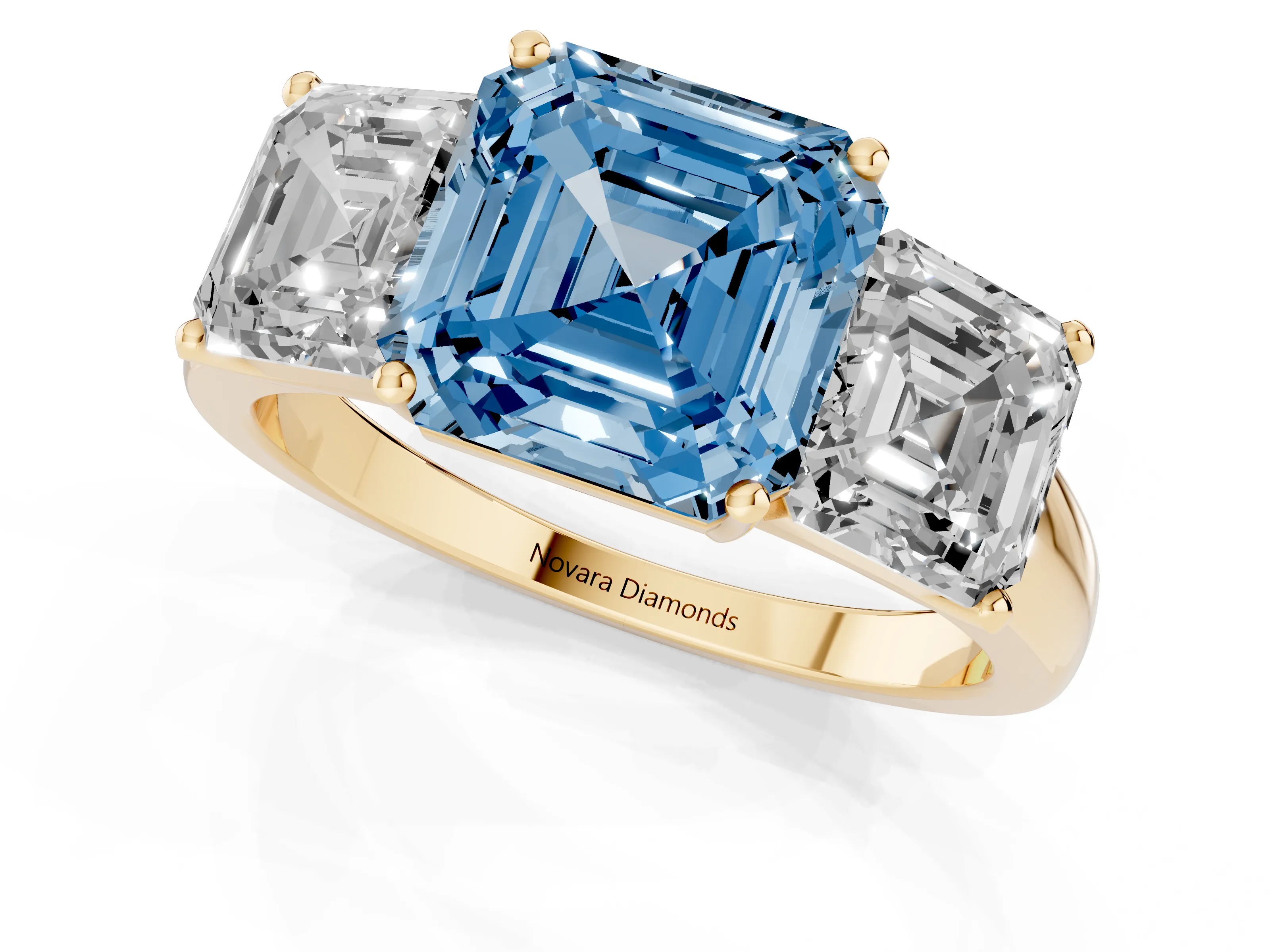 Fancy Blue Asscher Cut Diamond Three-Stone Ring Set in Yellow gold with Classic Prong Setting and Plain Band