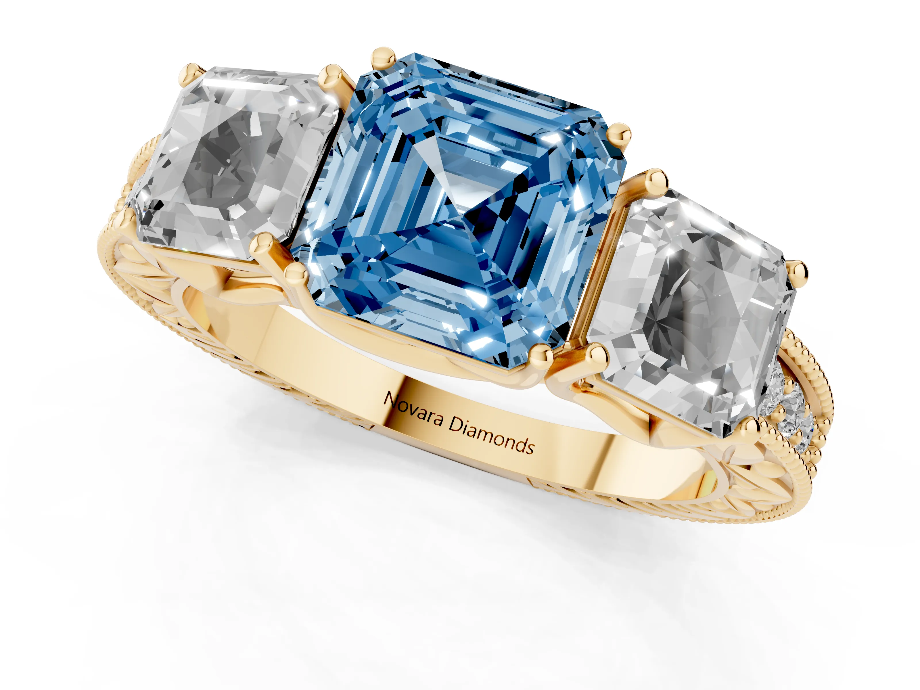 Fancy Blue Asscher Cut Diamond Three-Stone Engagement Ring Set in Yellow gold with Milgrain Pavé Band