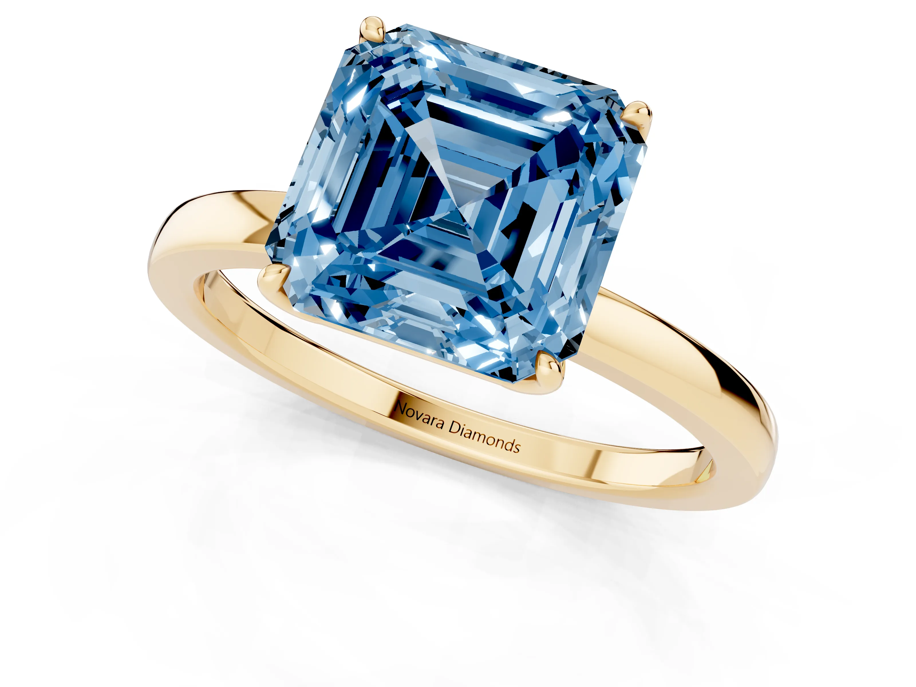 Fancy Blue Asscher Cut Diamond Solitaire Ring Set in Yellow gold with Prong Setting and Thin Polished Band