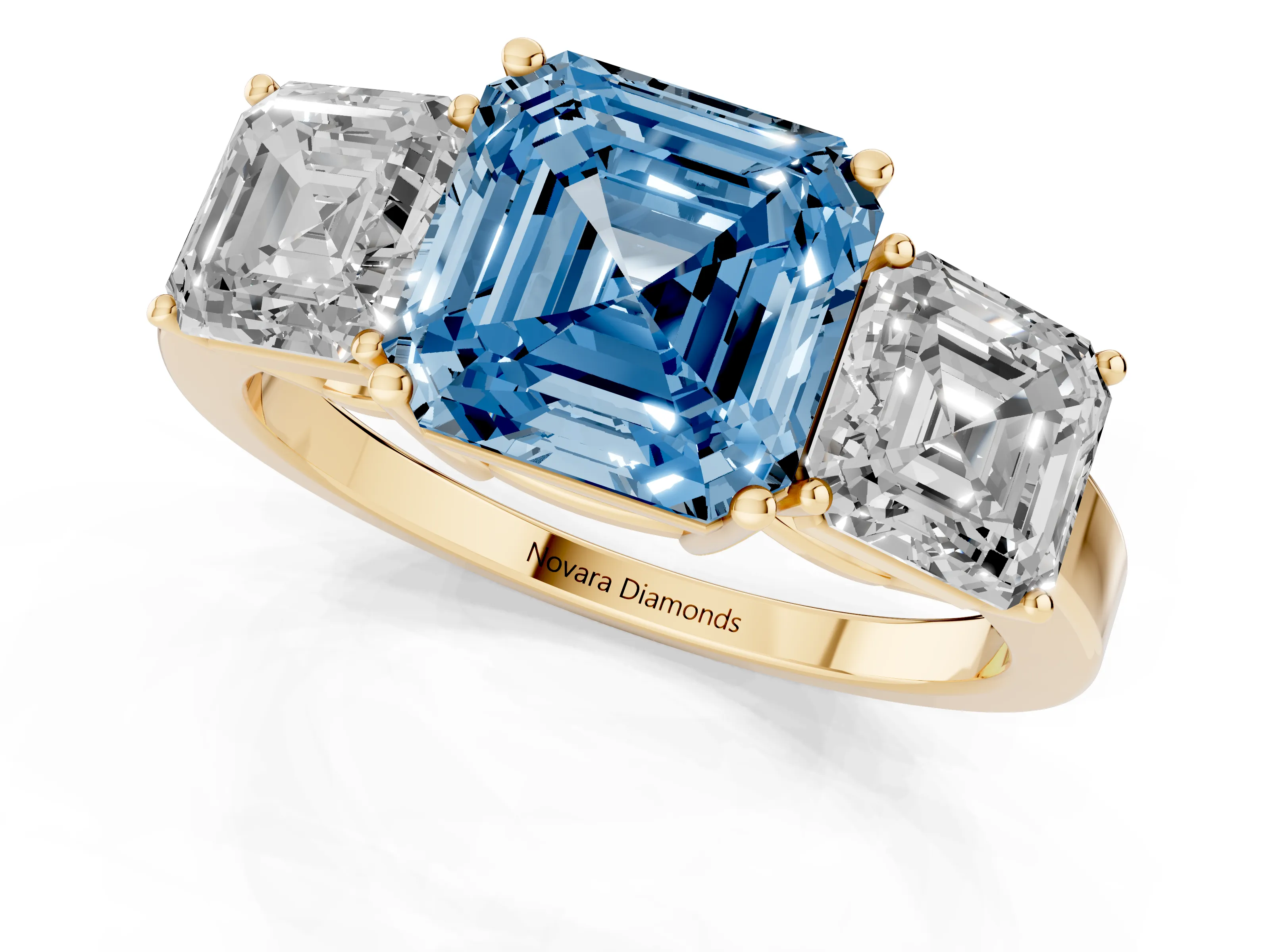 Fancy Blue Asscher Cut Diamond Three-Stone Engagement Ring Set in Yellow gold with Flat Band