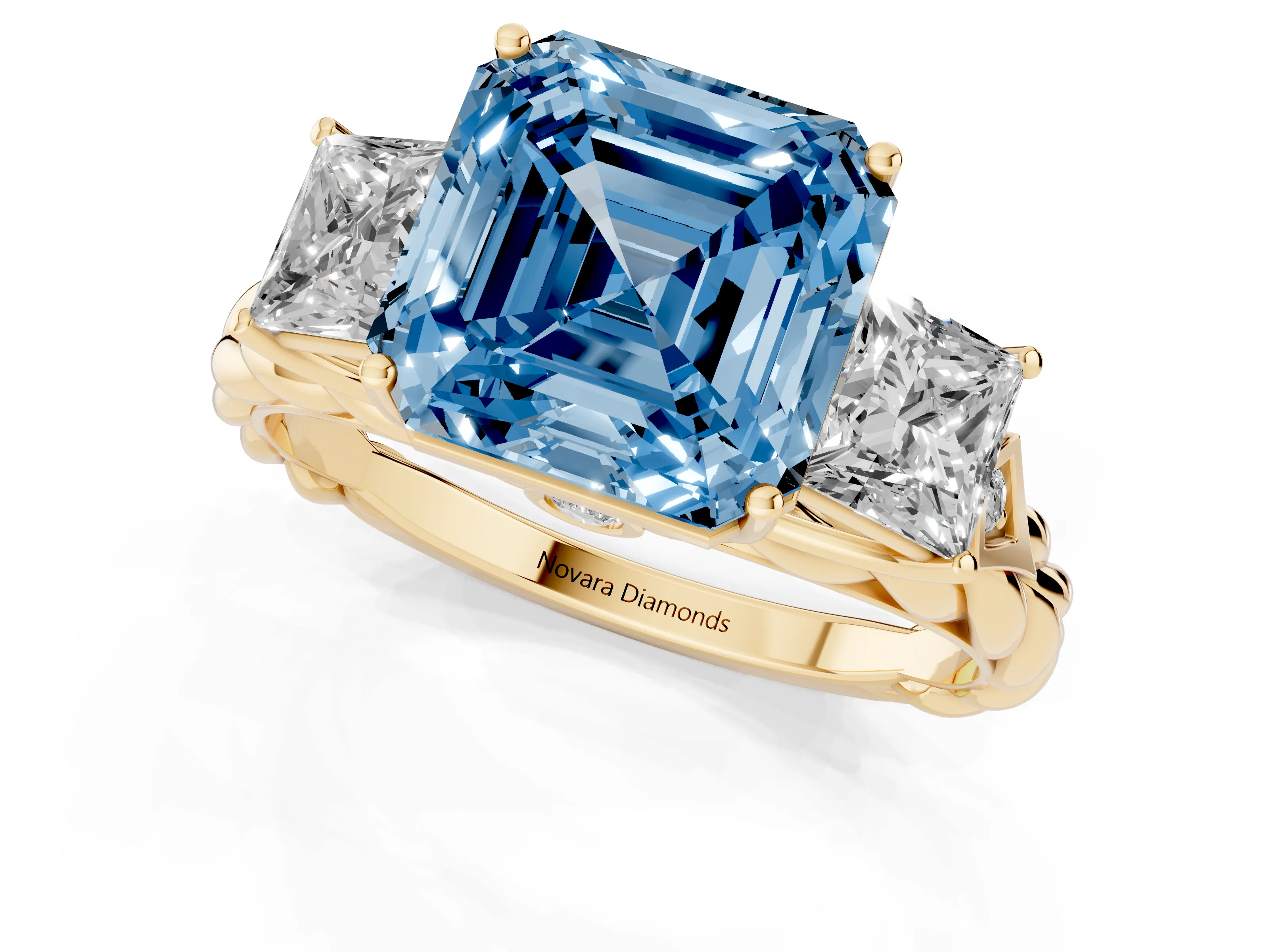 Fancy Blue Asscher Cut Diamond Three-Stone Ring Set in Yellow gold with Braided Band