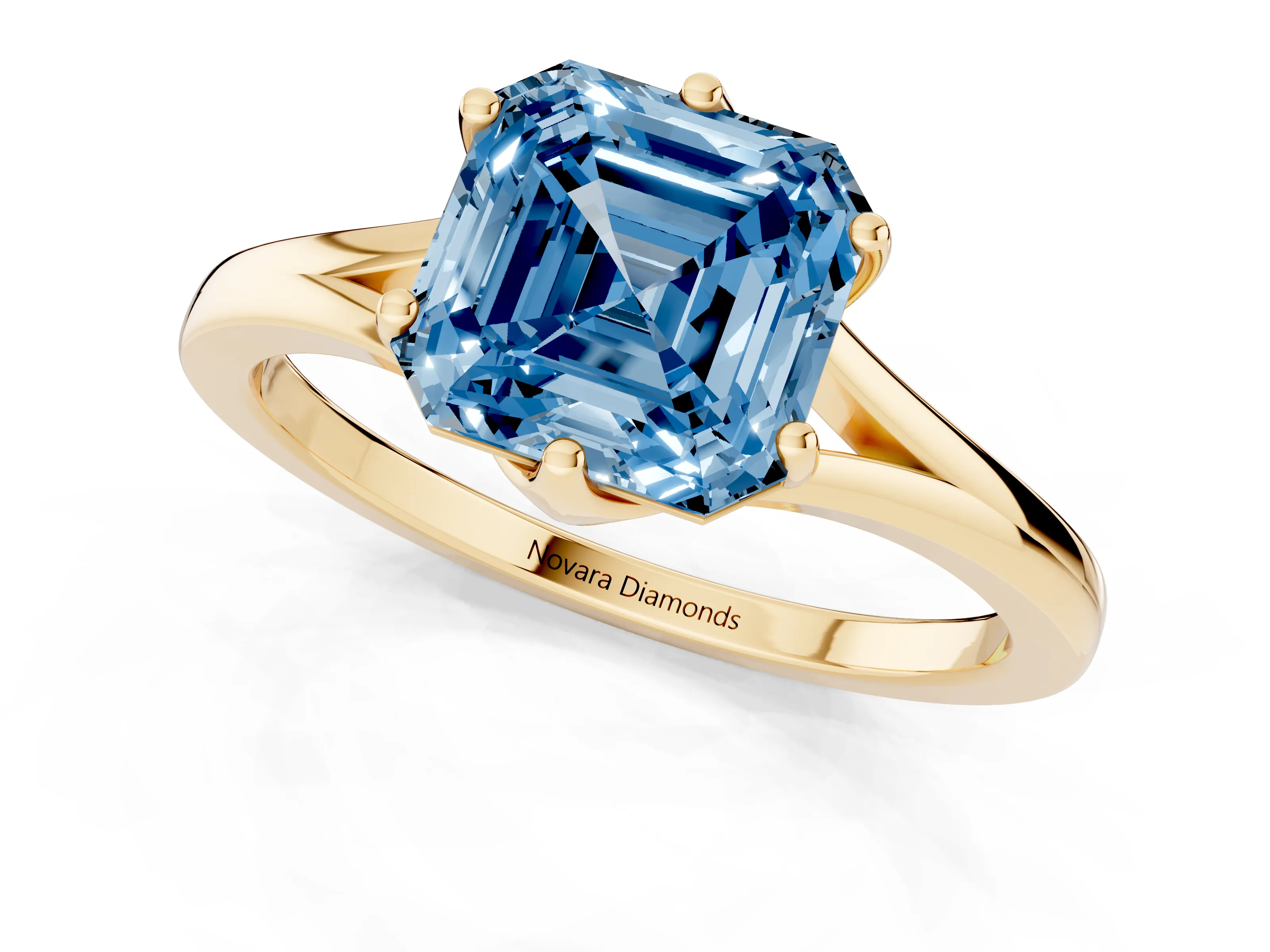 Fancy Blue Asscher Cut Diamond Solitaire Ring Set in Yellow gold with Polished Tapered Band and Prong Setting