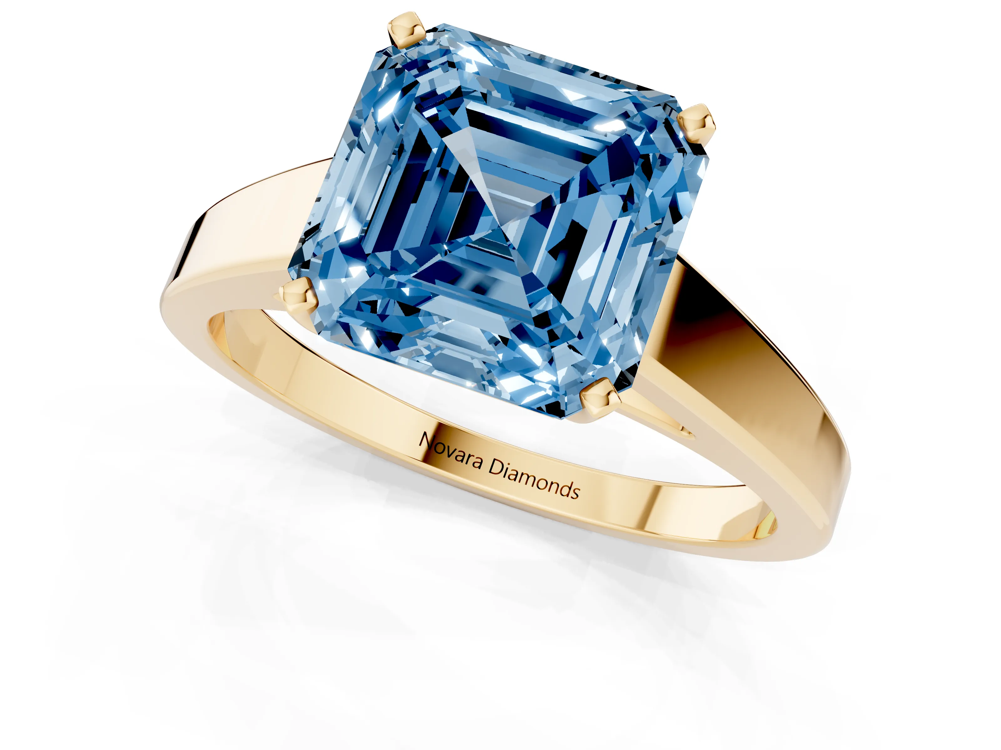 Fancy Blue Asscher Cut Diamond Solitaire Engagement Ring Set in Yellow gold with Prong Setting and Tapered Band