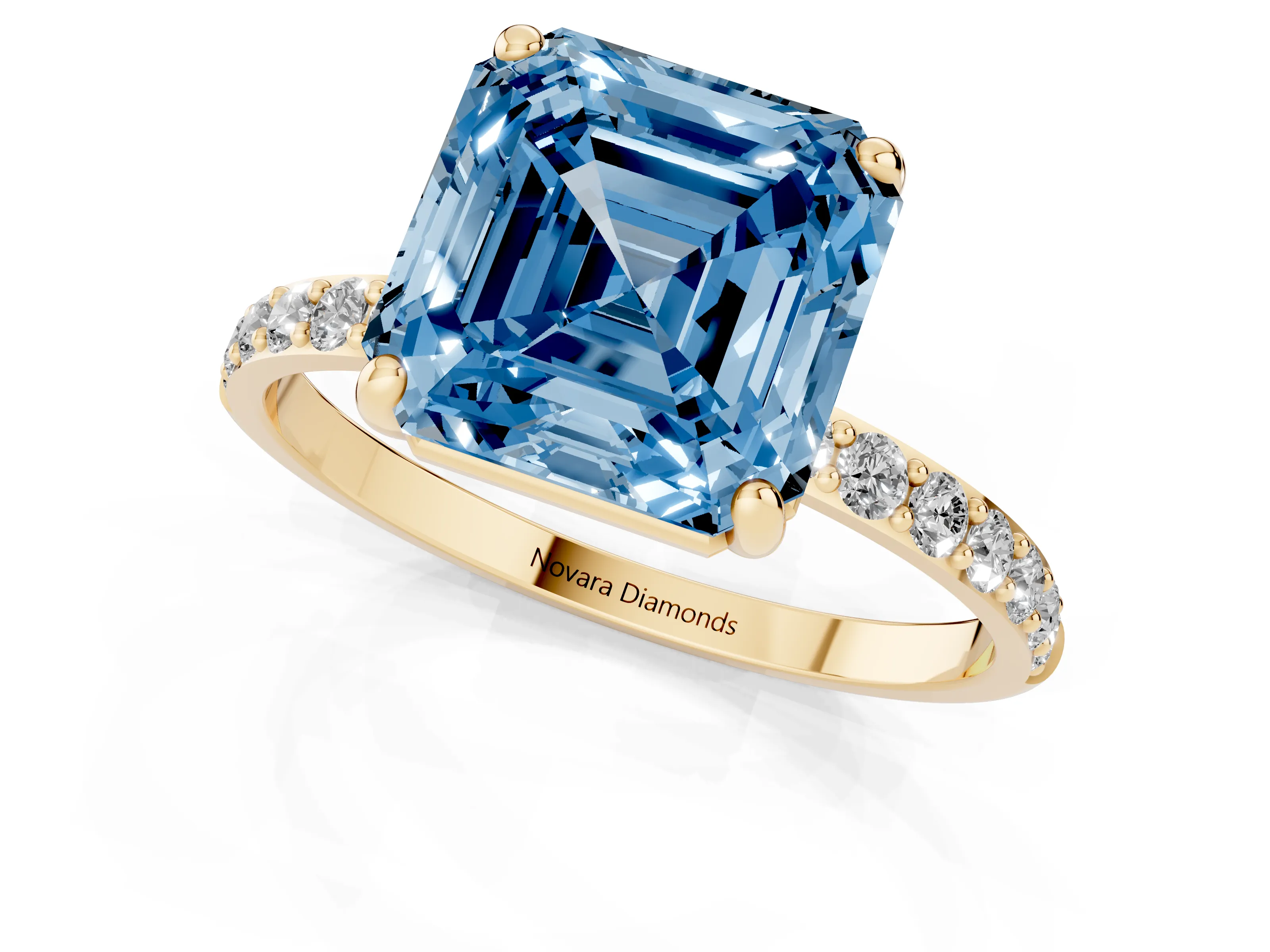 Fancy Blue Asscher Cut Diamond Solitaire Ring Set in Yellow gold with Round Pavé Band and Prong Setting