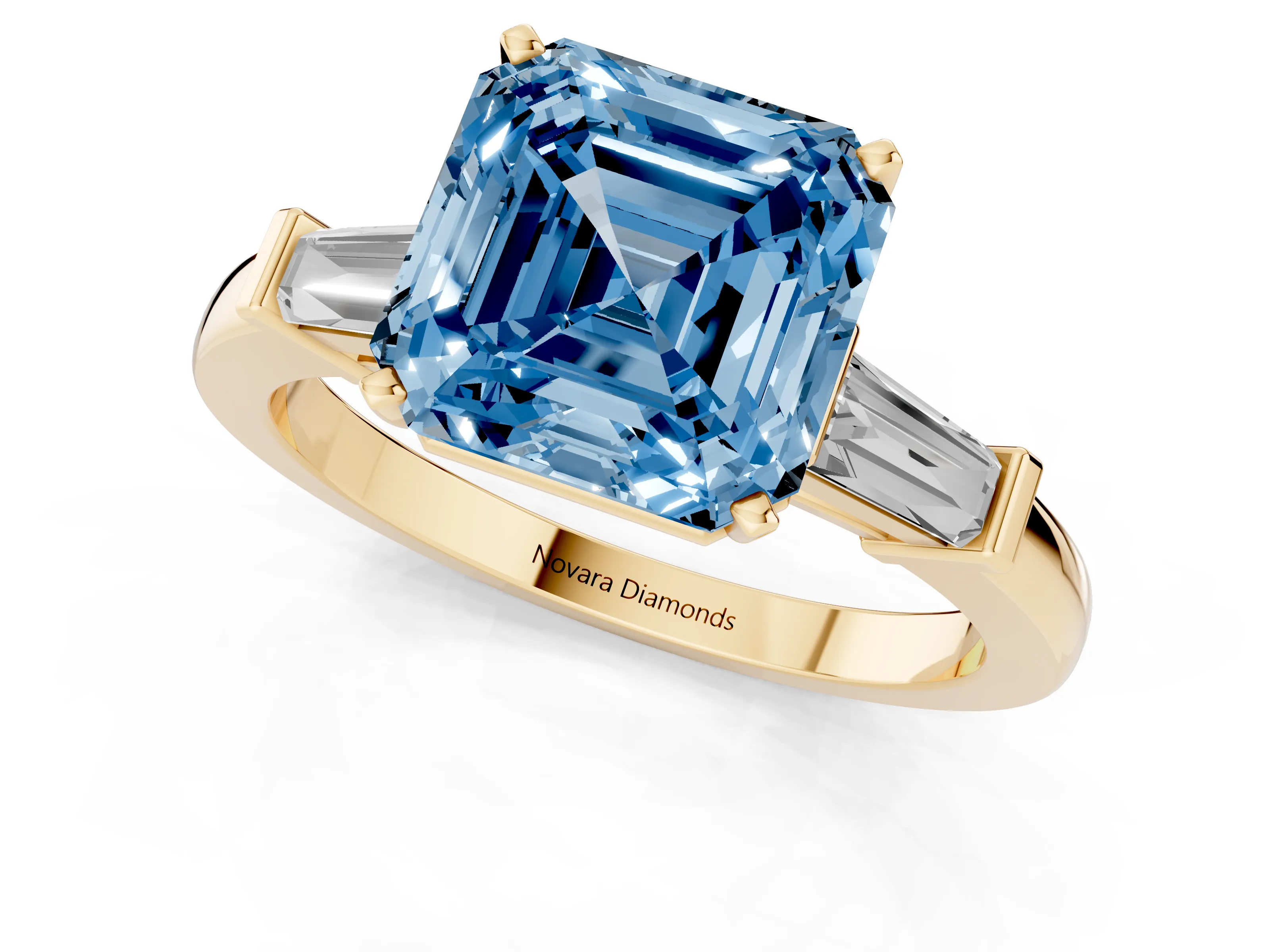 Fancy Blue Asscher Cut Diamond Solitaire Ring Set in Yellow gold with Tapered Baguette Accents and Prong Setting