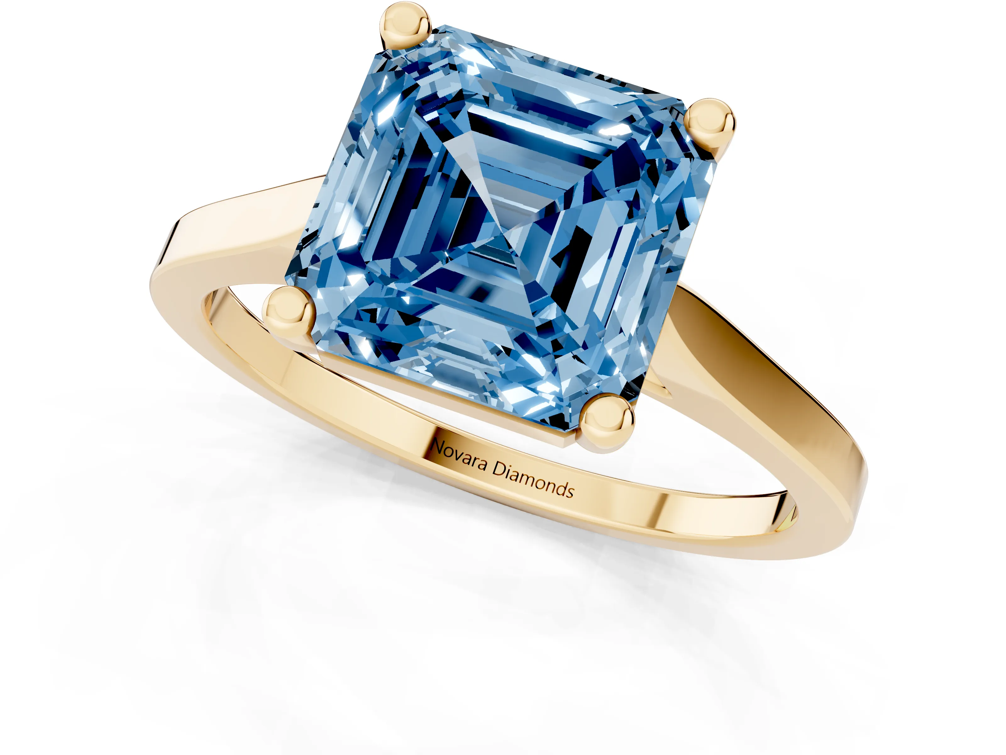 Fancy Blue Asscher Cut Diamond Solitaire Ring Set in Yellow gold with Prong Setting and Tapered Band