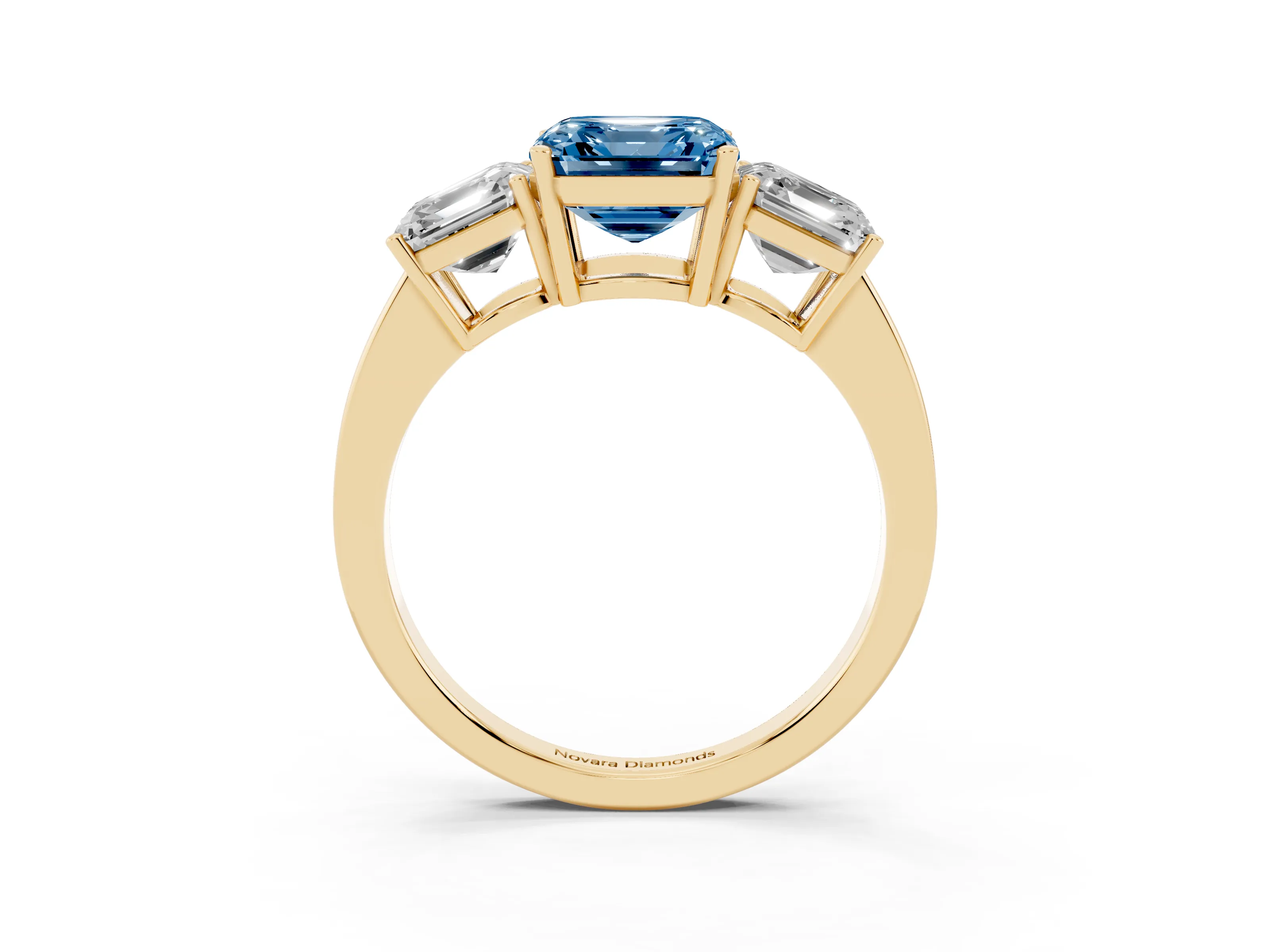 Fancy Blue Asscher Cut Diamond Three-Stone Engagement Ring Set in Yellow gold with Flat Band