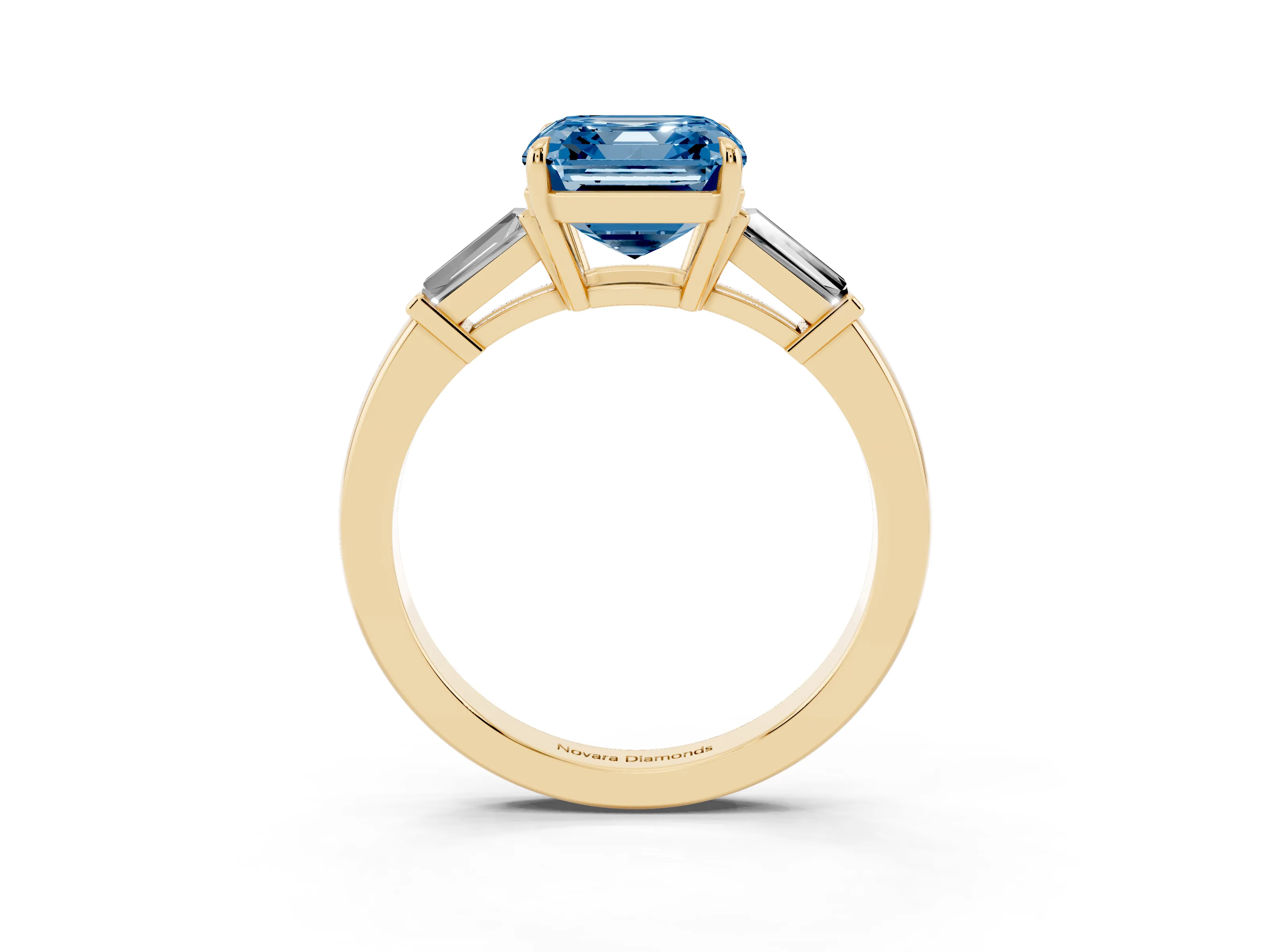 Fancy Blue Asscher Cut Diamond Three-Stone Ring Set in Yellow gold with Tapered Baguette Side Stones and Prong Setting