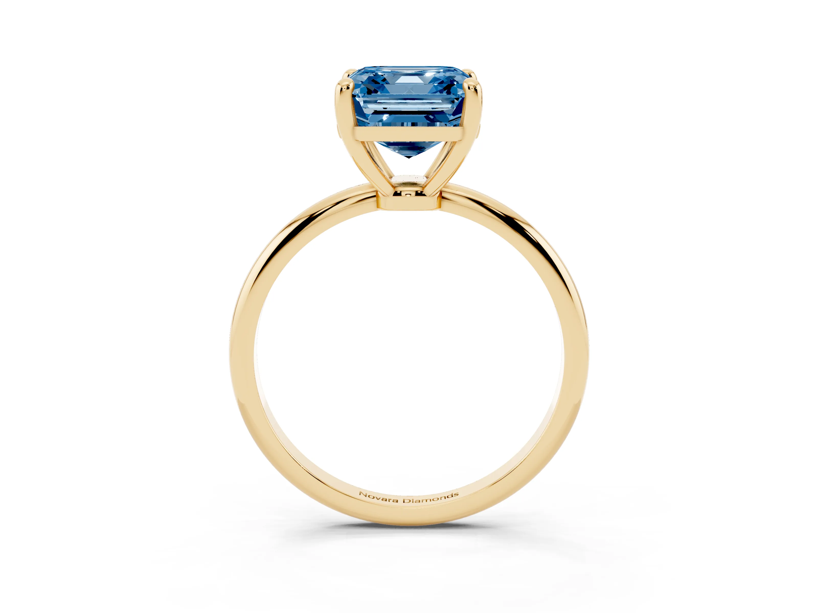 Fancy Blue Asscher Cut Diamond Solitaire Ring Set in Yellow gold with Secure Prong Setting on a Classic Band
