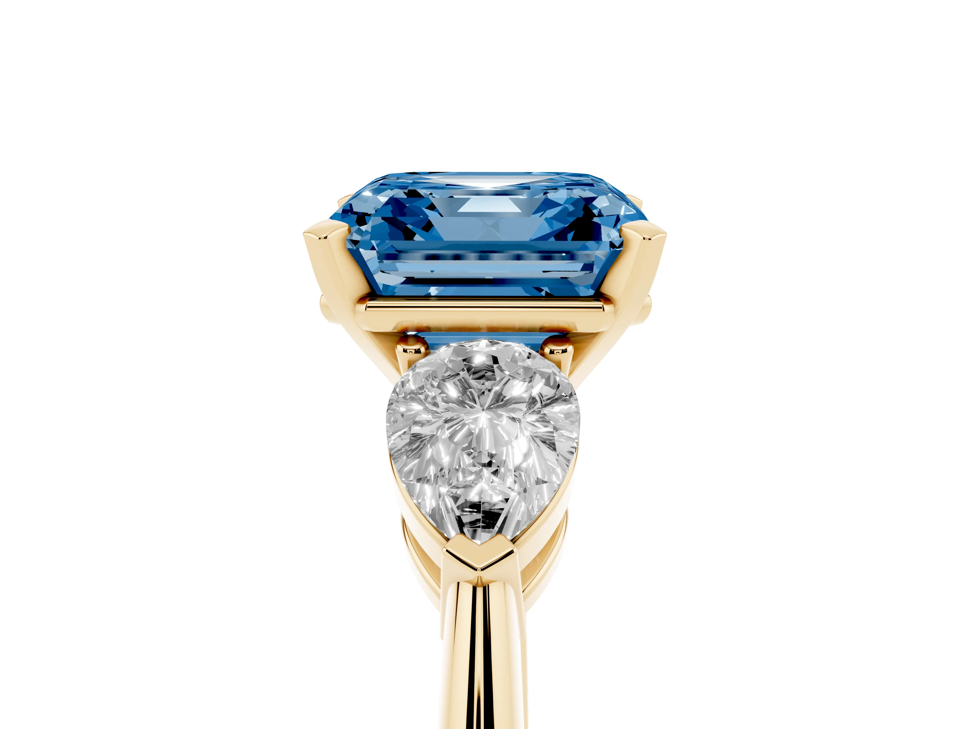 Fancy Blue Three-Stone Asscher Cut Diamond Ring Set in Yellow gold with Pear Side Stones and Prong Setting