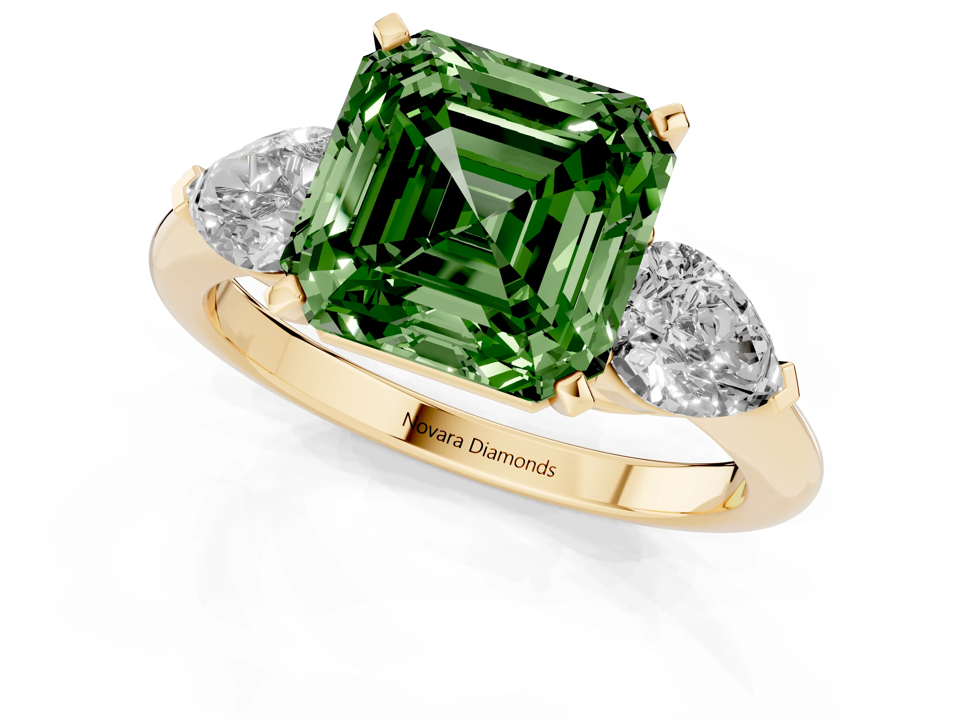 Fancy Green Three-Stone Asscher Cut Diamond Ring Set in Yellow gold with Pear Side Stones and Prong Setting