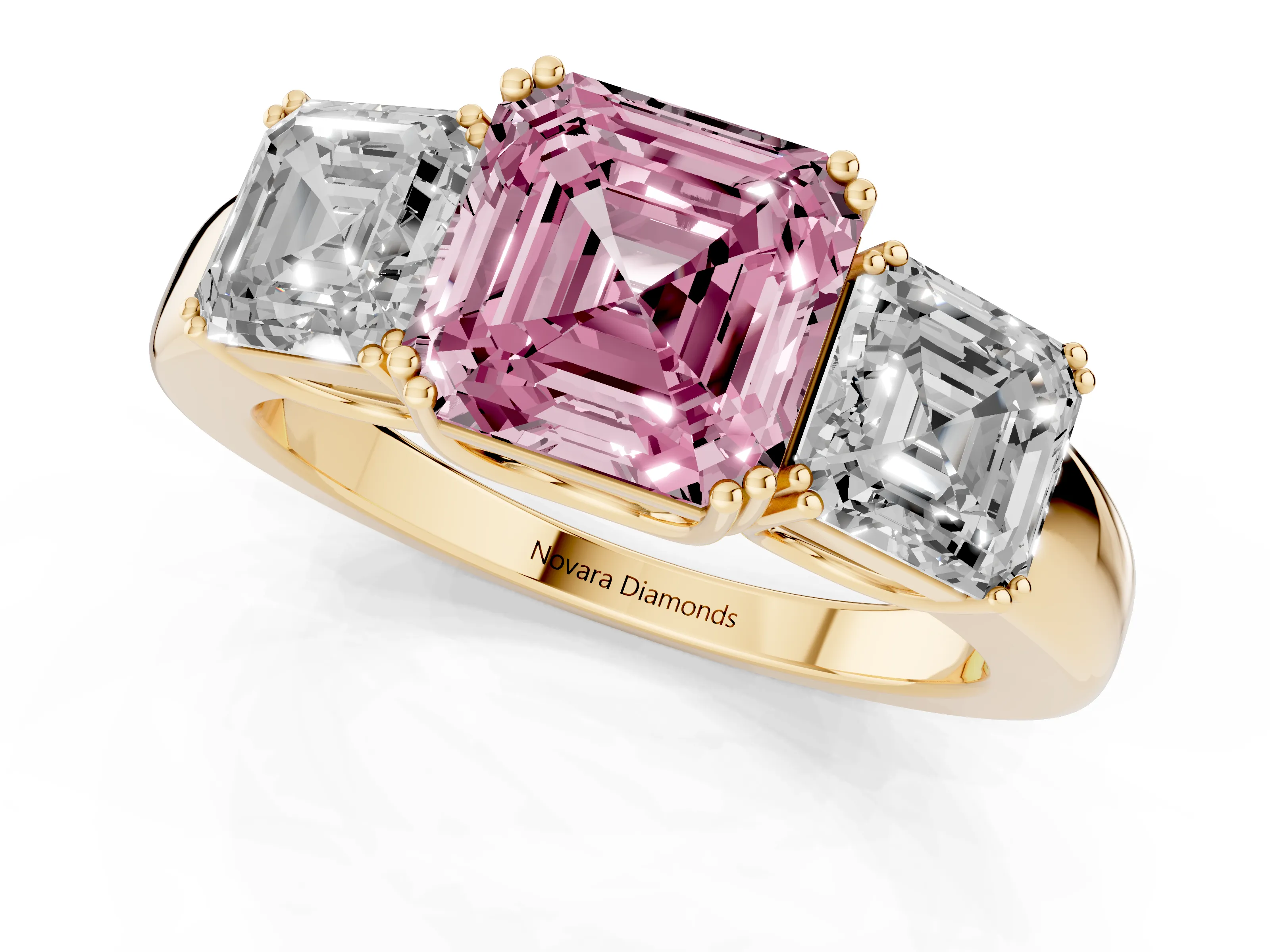 Fancy Pink Asscher Cut Diamond Three-Stone Ring Set in Yellow gold with Polished Band and Prong Setting