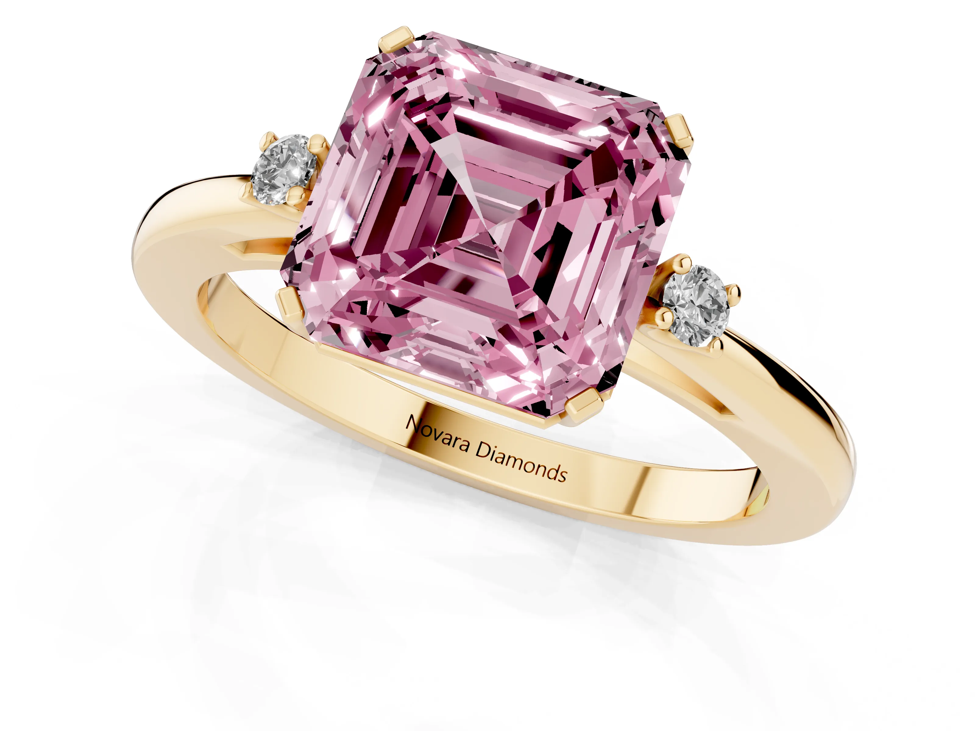 Fancy Pink Three-Stone Asscher Cut Diamond Solitaire Ring Set in Yellow gold with Round Accent Stones and Prong Setting