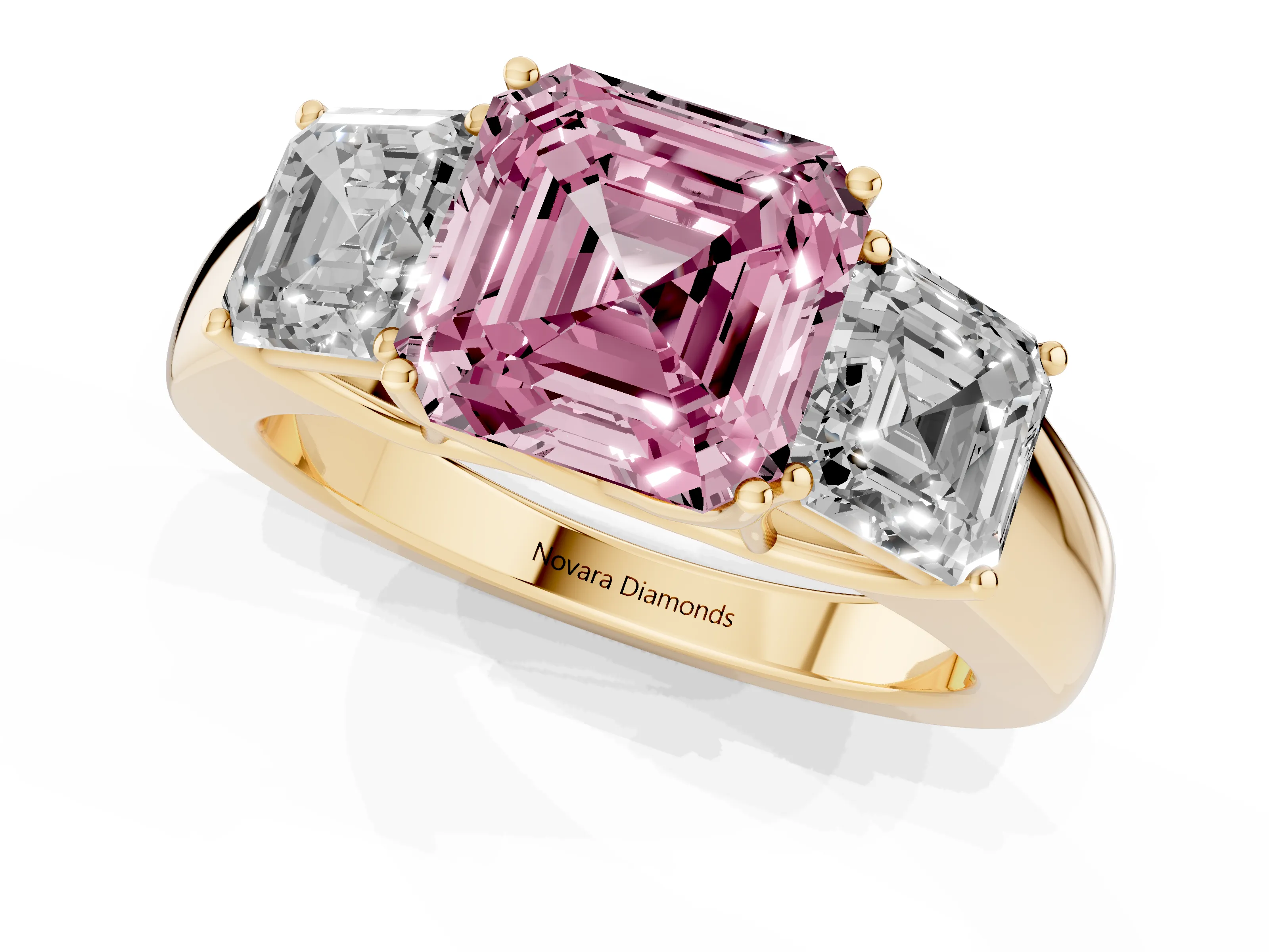Fancy Pink Three-Stone Asscher Cut Diamond Ring Set in Yellow gold with Matching Prong Settings and Plain Band
