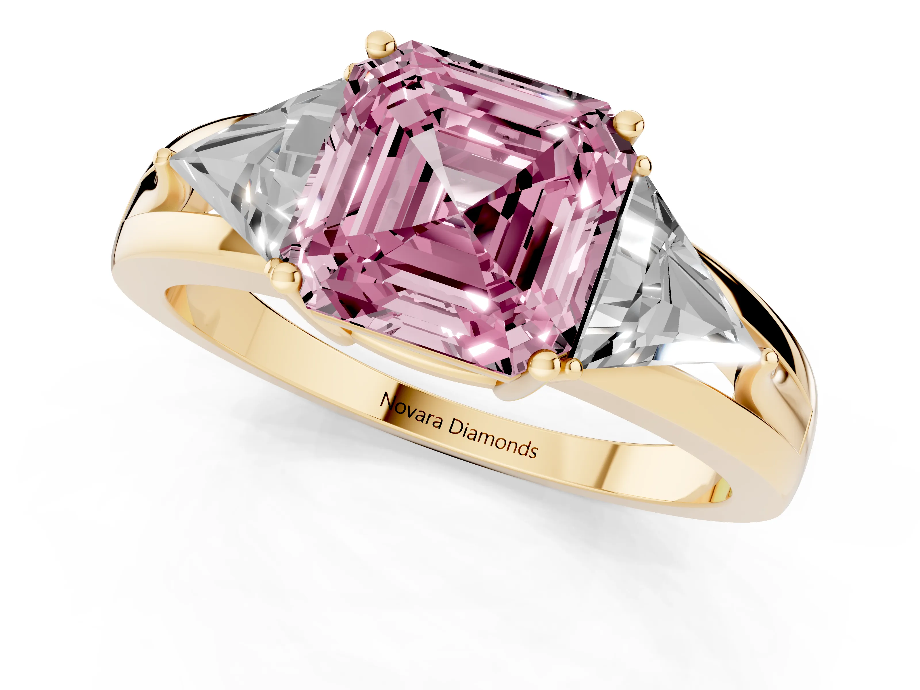 Fancy Pink Asscher Cut Diamond Three-Stone Ring Set in Yellow gold with Trillion Side Stones and Split Shank