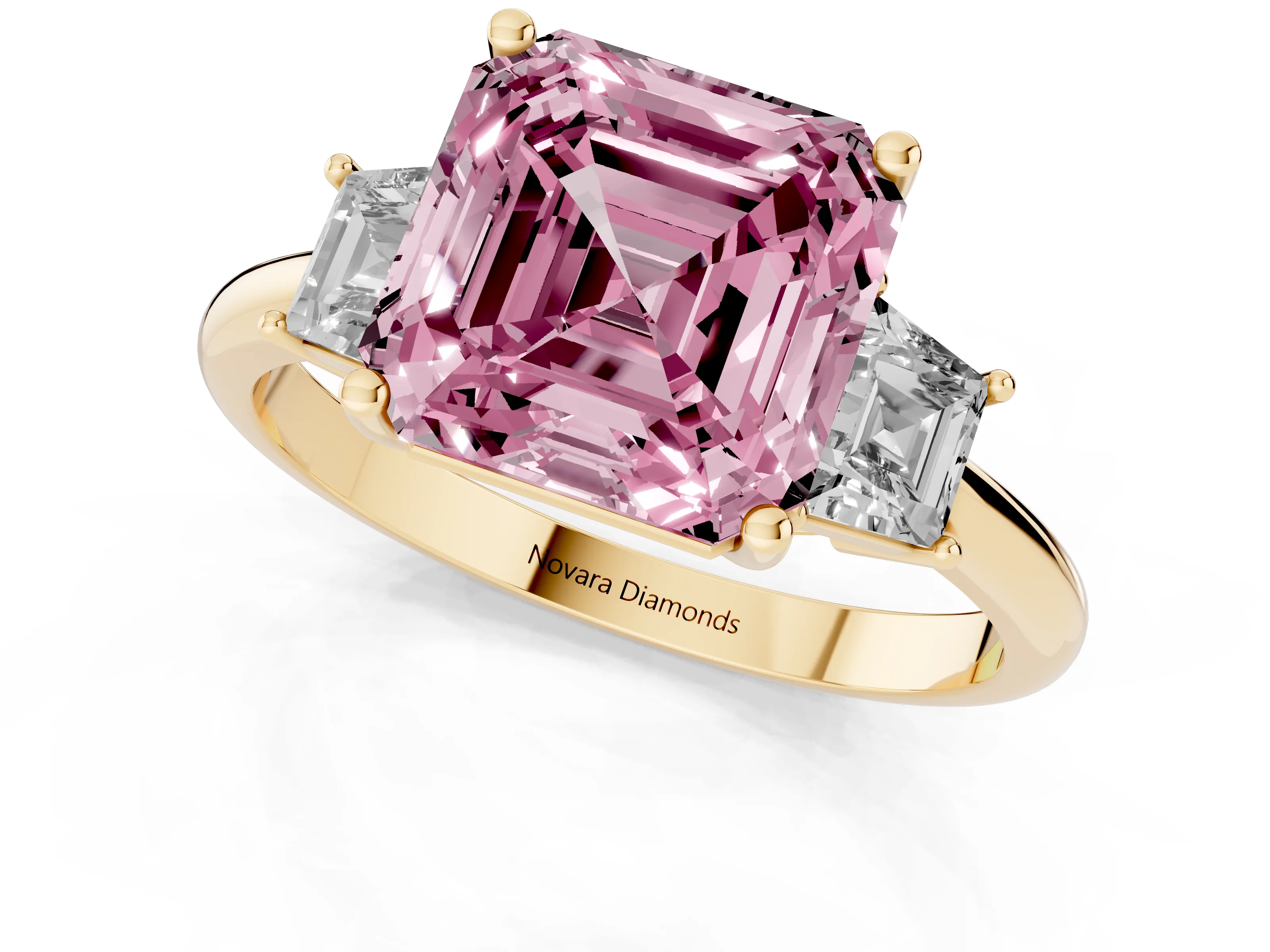Fancy Pink Asscher Cut Diamond Three-Stone Ring Set in Yellow gold with Trapezoid Side Stones and Prong Setting