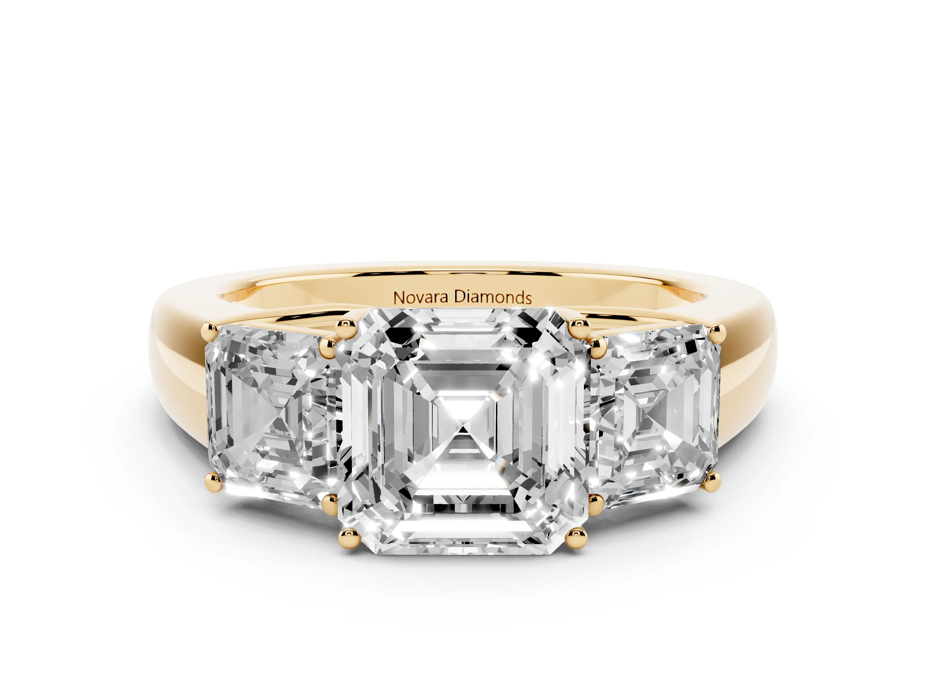 Three-Stone Asscher Cut Diamond Ring Set in Yellow gold with Matching Prong Settings and Plain Band