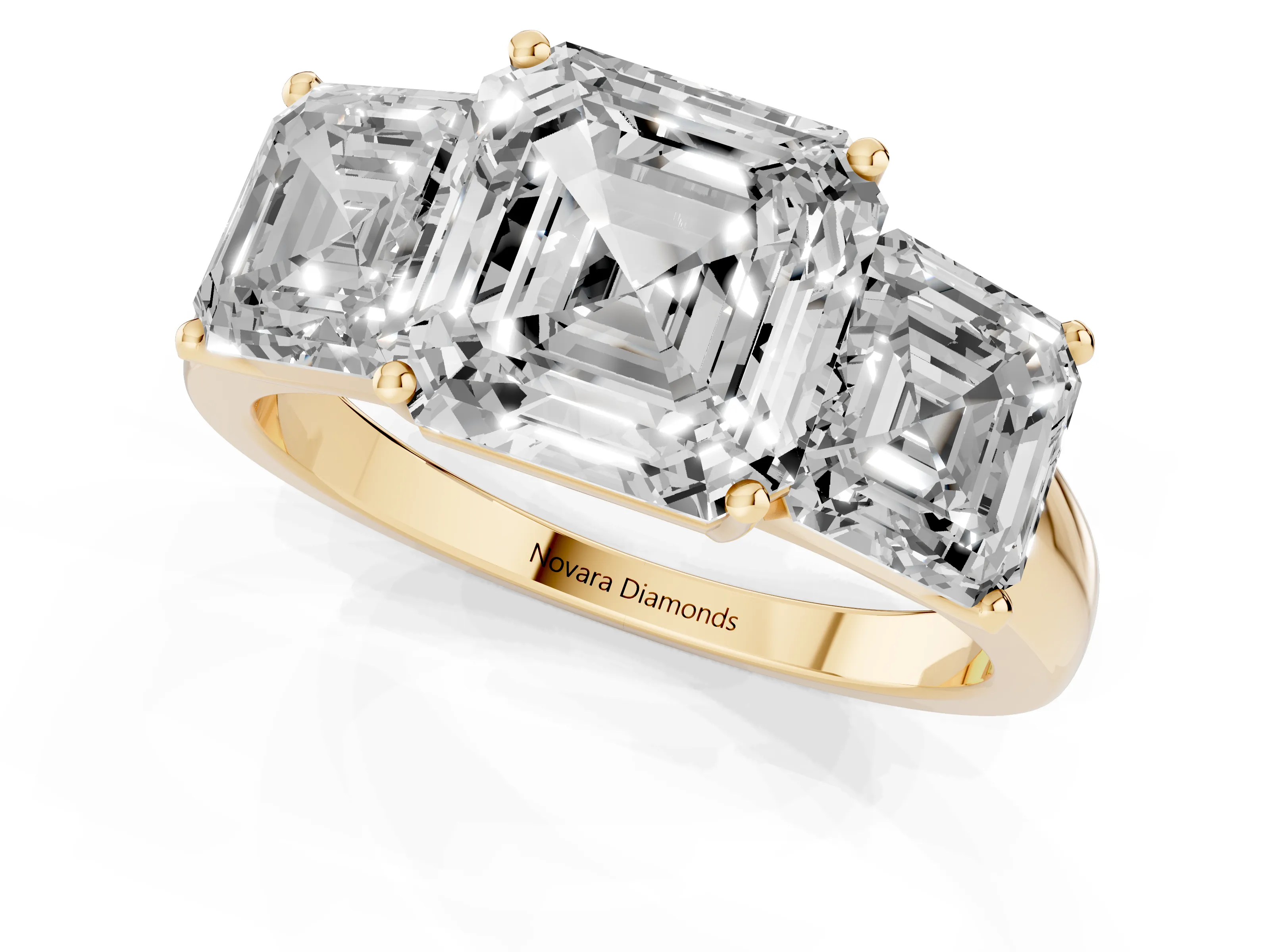 Asscher Cut Diamond Three-Stone Ring Set in Yellow gold with Classic Prong Setting and Plain Band