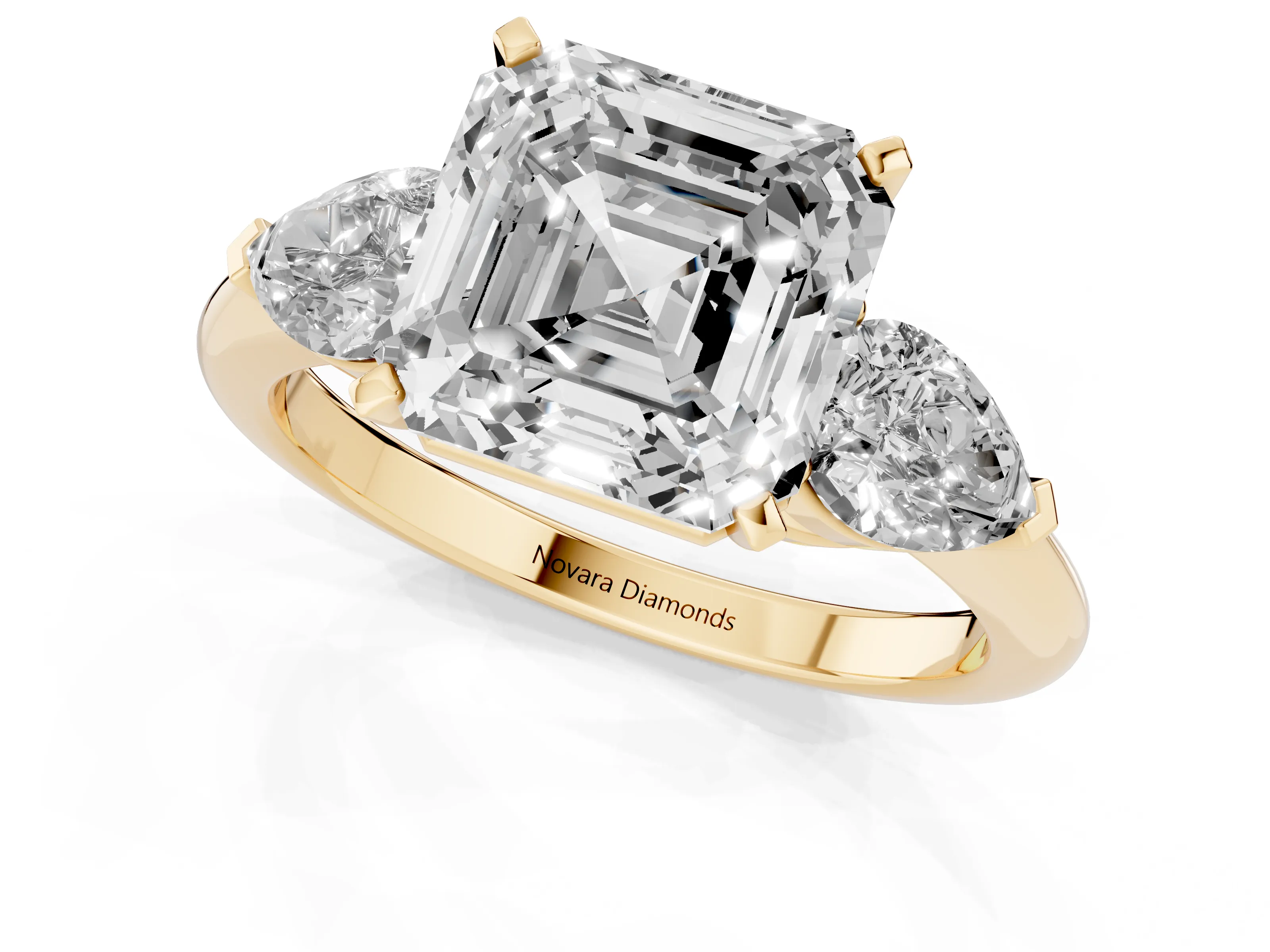 Three-Stone Asscher Cut Diamond Ring Set in Yellow gold with Pear Side Stones and Prong Setting – second view
