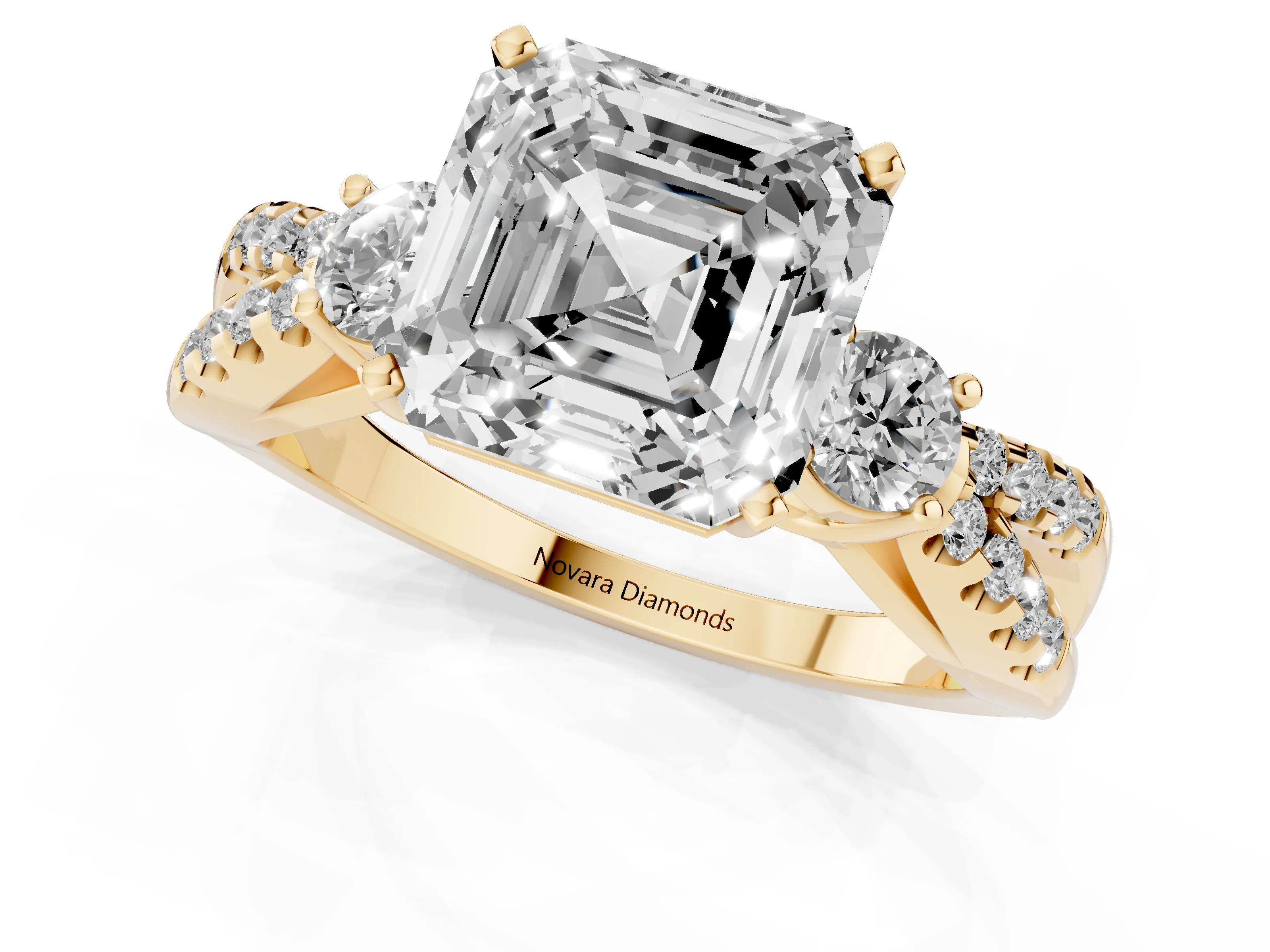 Asscher Cut Diamond Three-Stone Ring Set in Yellow gold with Pavé Split Shank and Prong Setting