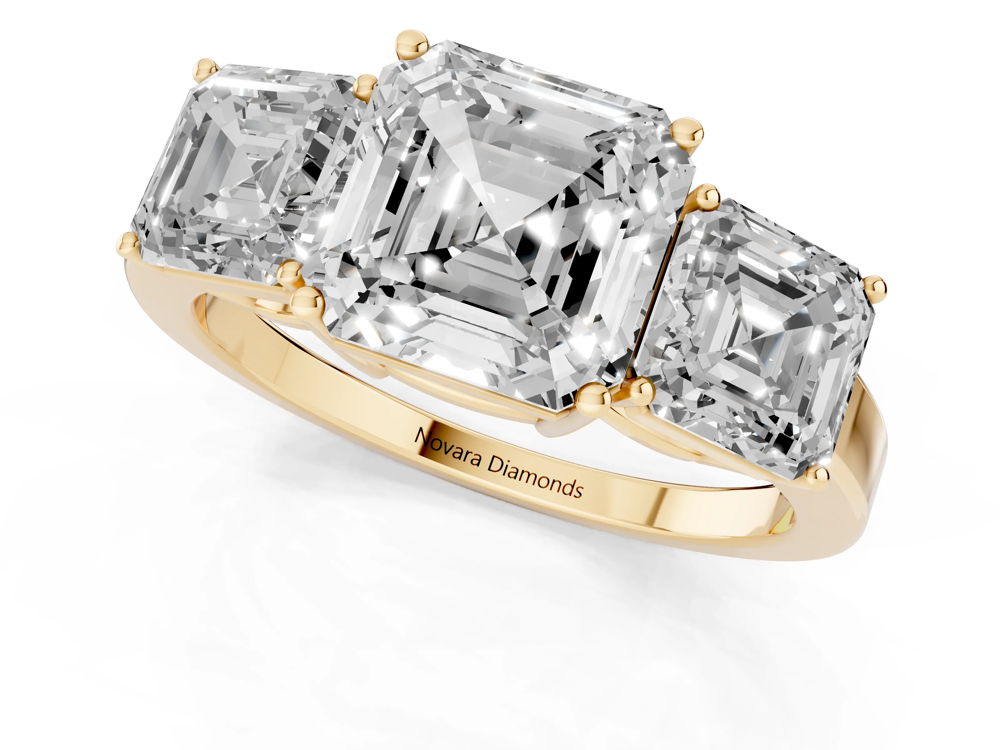 Asscher Cut Diamond Three-Stone Engagement Ring Set in Yellow gold with Flat Band