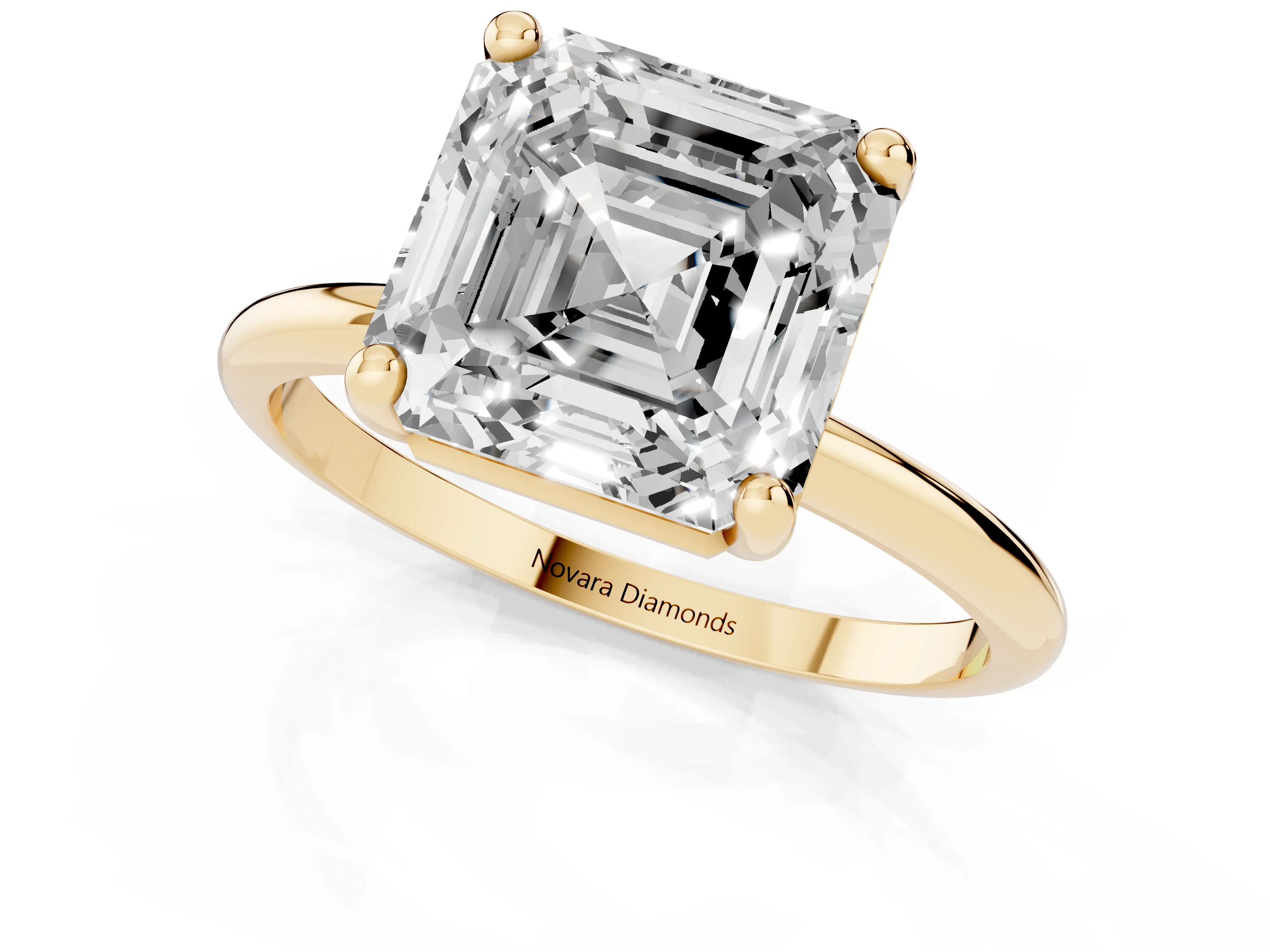 Asscher Cut Diamond Solitaire Ring Set in Yellow gold with Secure Prong Setting on a Classic Band