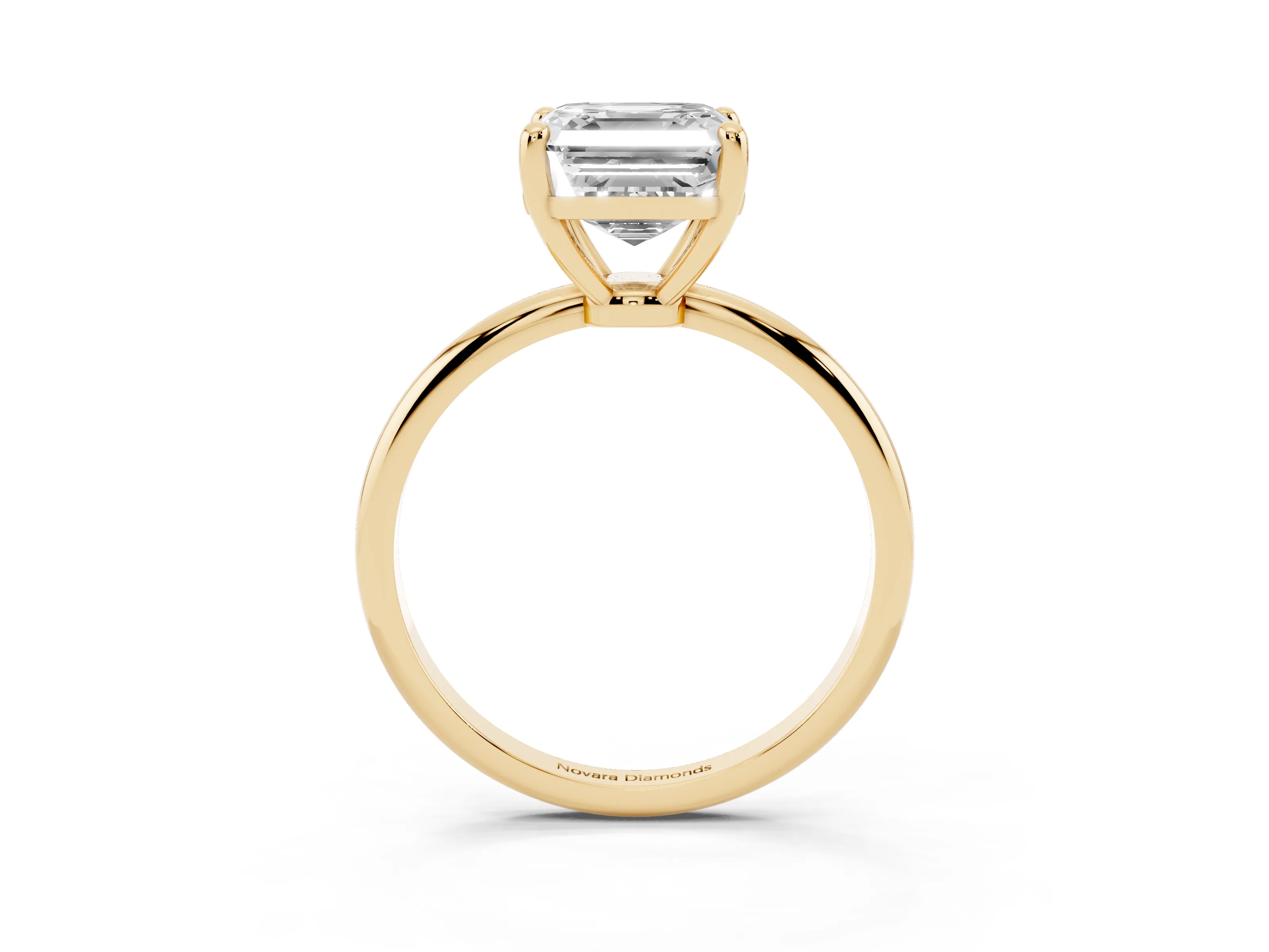 Asscher Cut Diamond Solitaire Ring Set in Yellow gold with Secure Prong Setting on a Classic Band