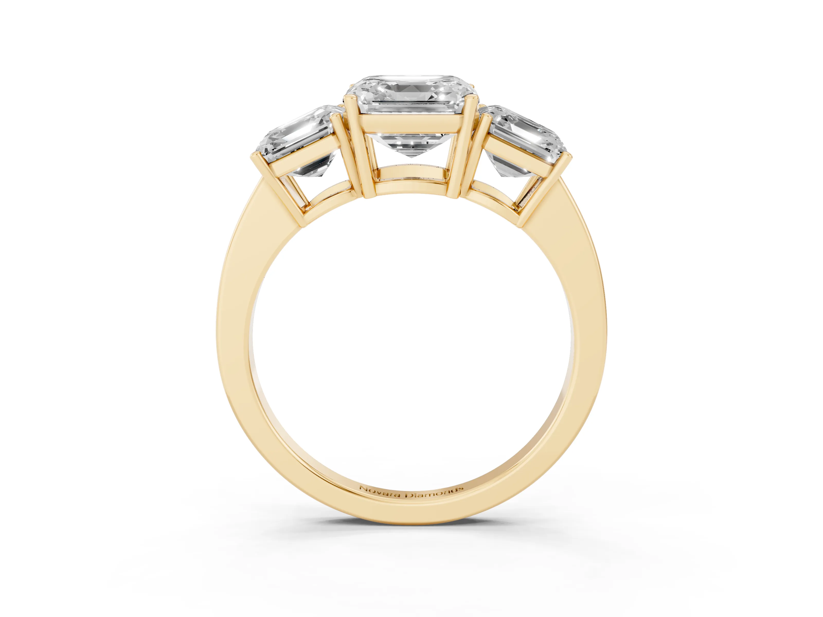 Asscher Cut Diamond Three-Stone Engagement Ring Set in Yellow gold with Flat Band