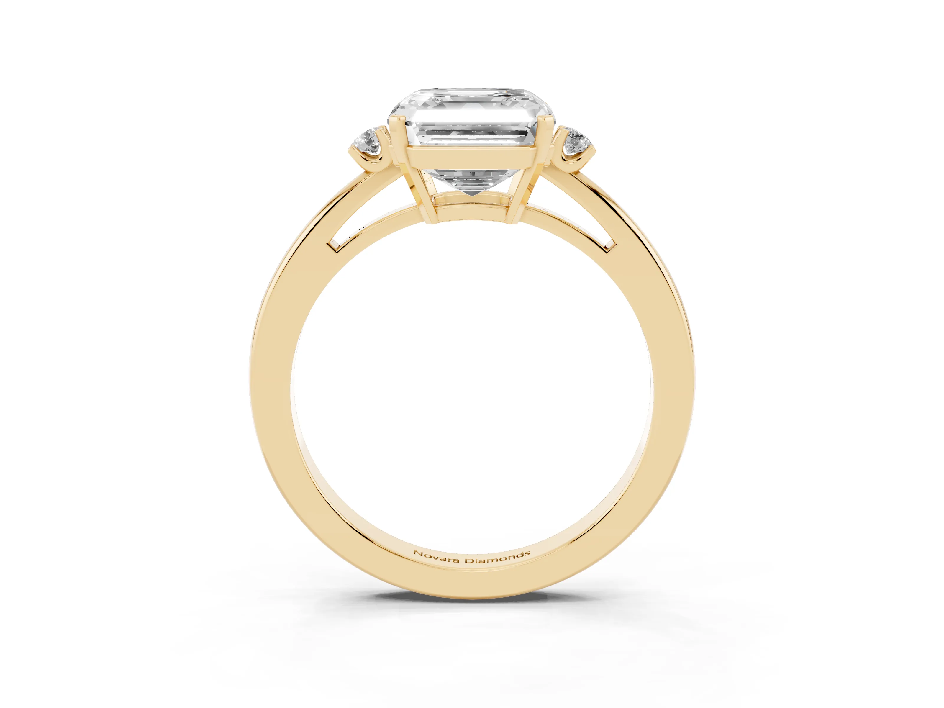 Three-Stone Asscher Cut Diamond Solitaire Ring Set in Yellow gold with Round Accent Stones and Prong Setting